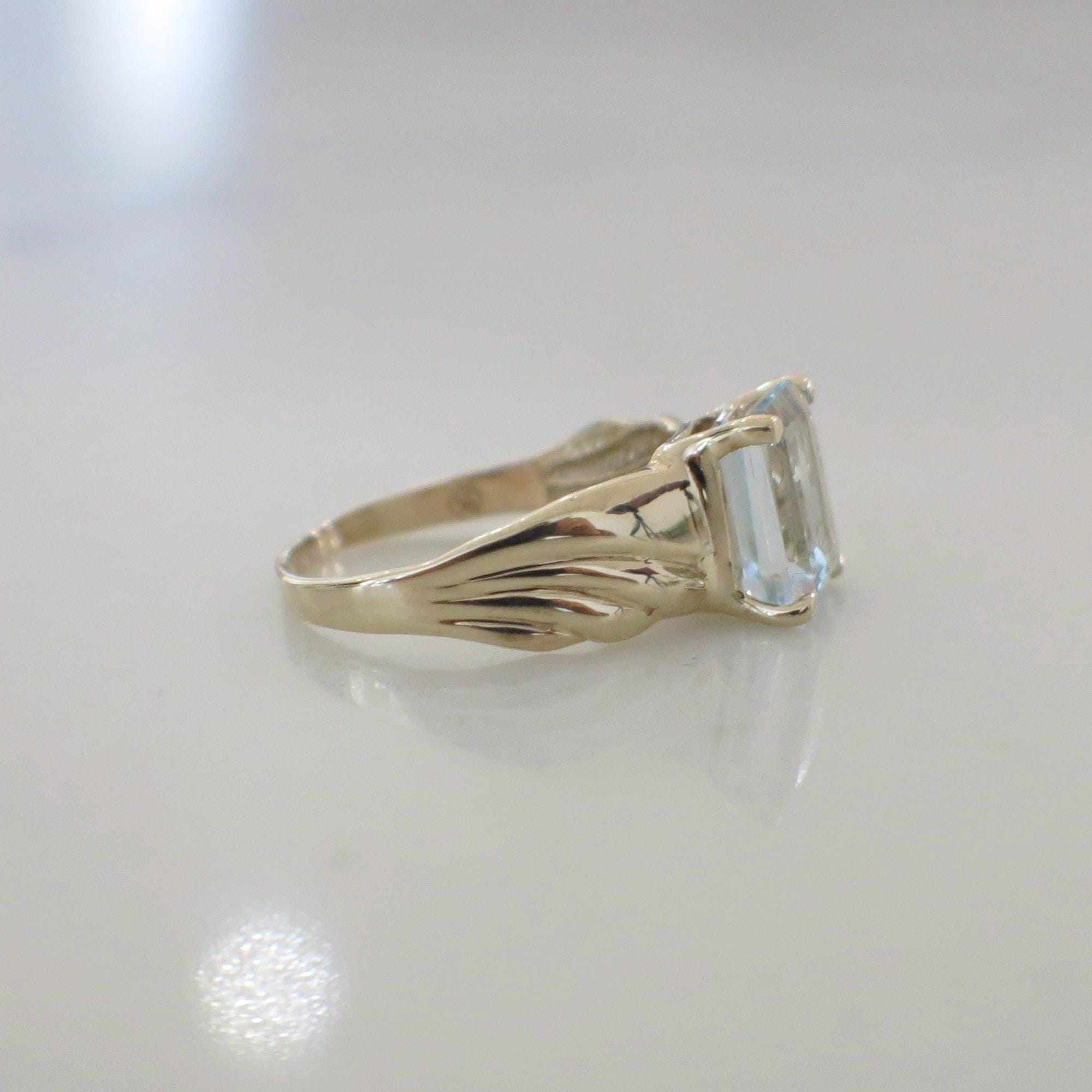 Emerald Cut Sky Blue Topaz Solitaire Ring – 10K Yellow Gold, Size 6.75 - Black Market LLC