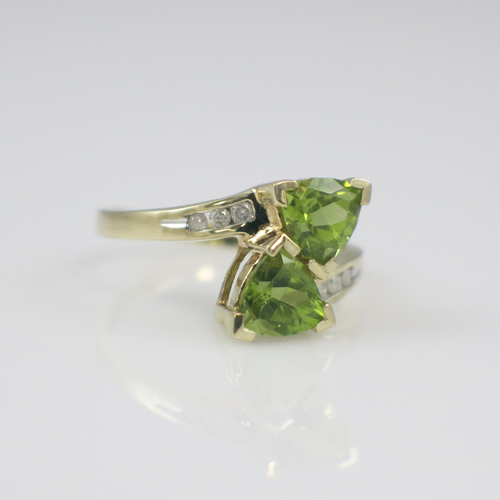 10K Yellow Gold Peridot Ring – Trillion Cut Bypass Ring with Diamond Accents