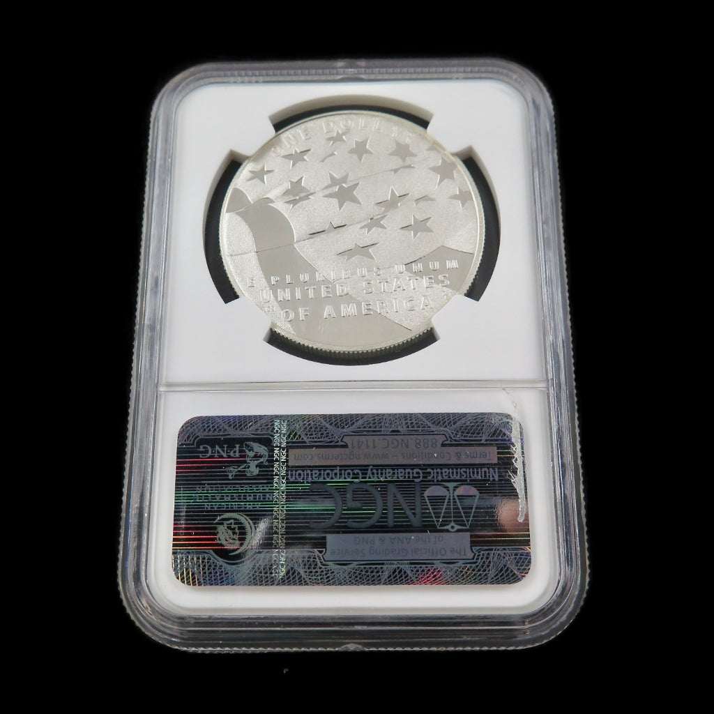 Close-up of the 2012 Star Spangled Banner Dollar commemorative coin in PF70 NGC ER grade, showcasing intricate patriotic design.