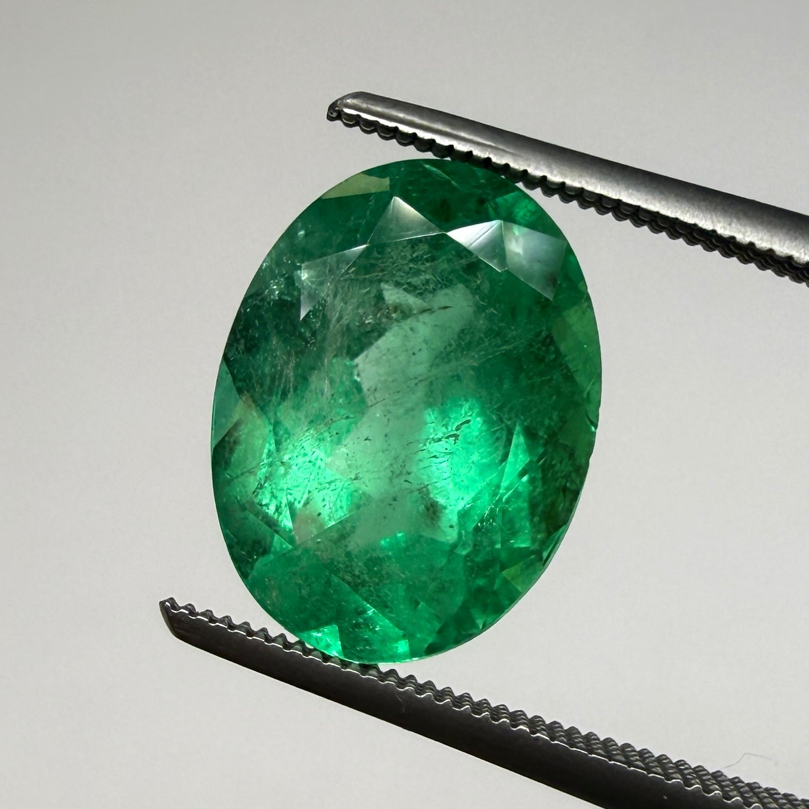GIA Certified Emerald 2.45ct Oval Green Beryl, F1 Minor Enhancement, 10.54 x 7.94mm