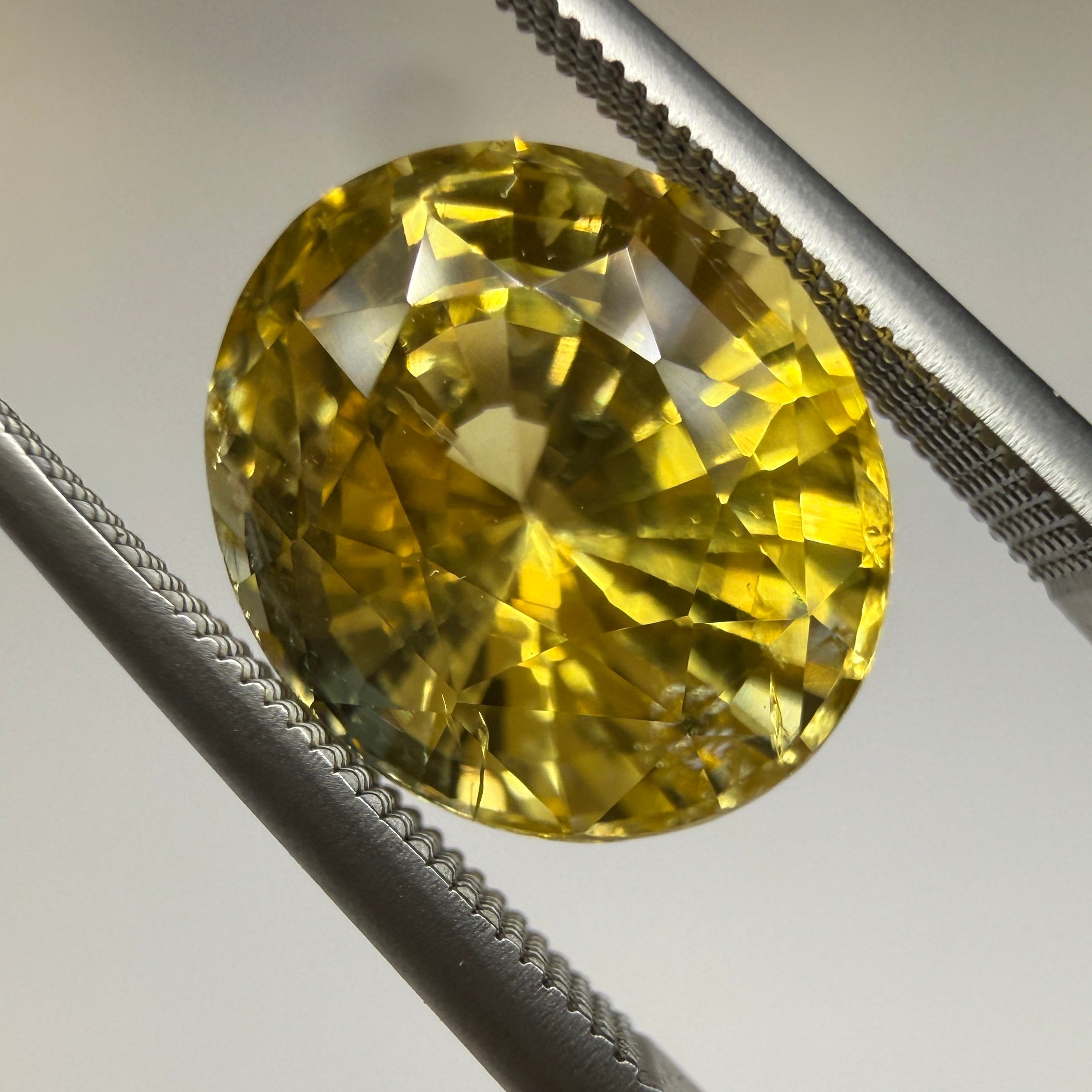 GIA Yellow Sapphire 4.10ct Oval, Heated Natural Sapphire, 9.77 x 8.56mm