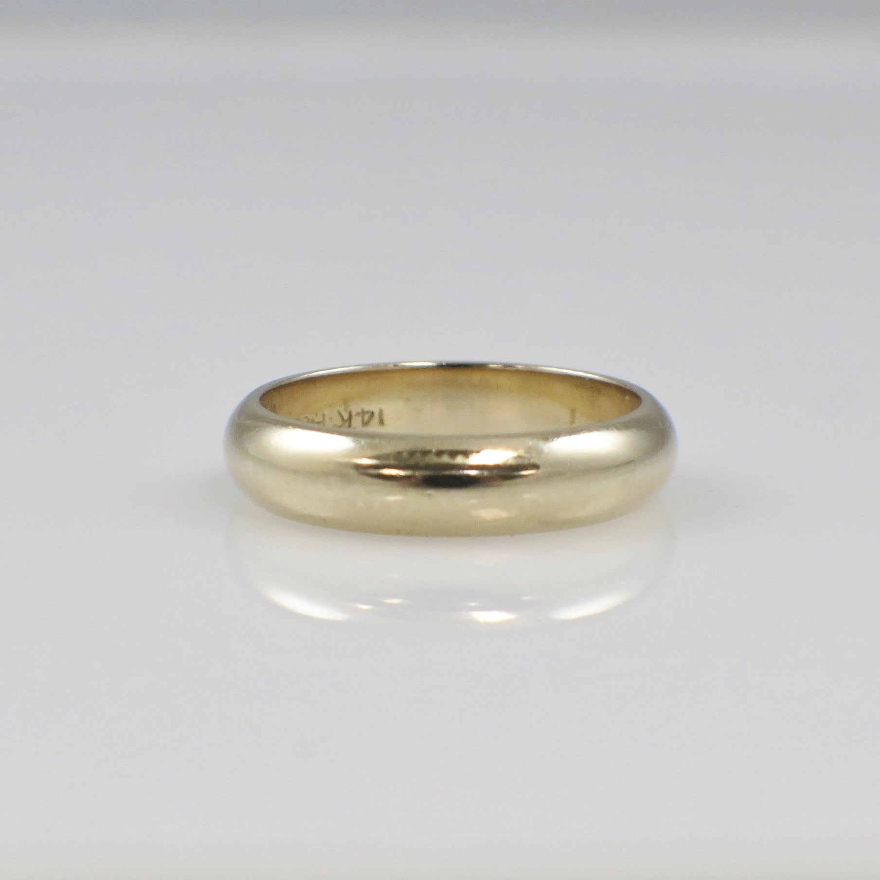 14K yellow gold men's wedding band, 5mm width in size 8.75, classic and sleek design by Black Market LLC.