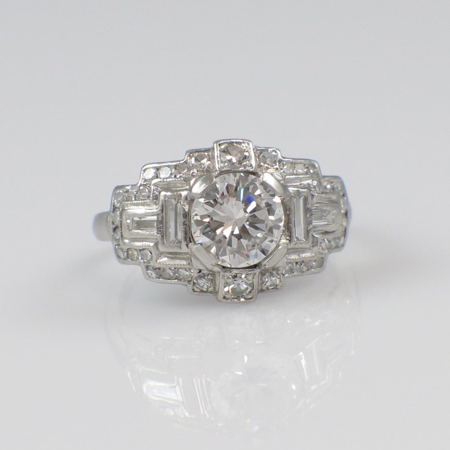 Art Deco platinum diamond ring with 0.88ct E SI1 GIA vintage engagement design by Lillian James Bridal