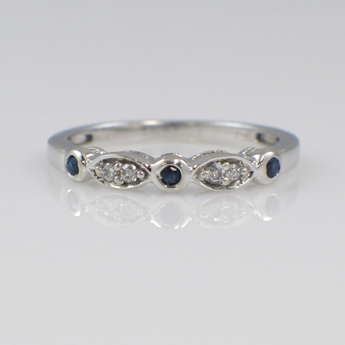 Vintage 10K white gold diamond and sapphire band ring, bezel stackable design in size 6.75, by Black Market LLC.