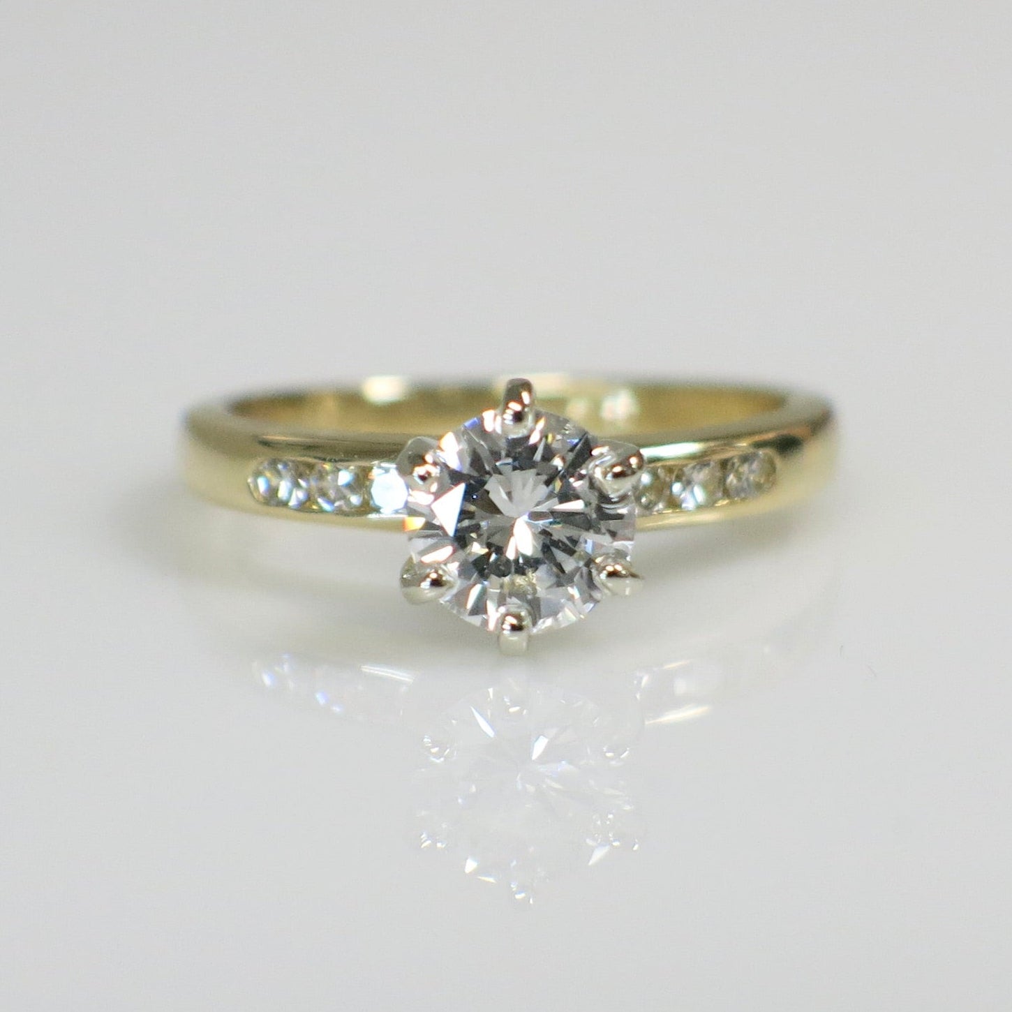Gold Engagement Ring with Accenting Diamonds