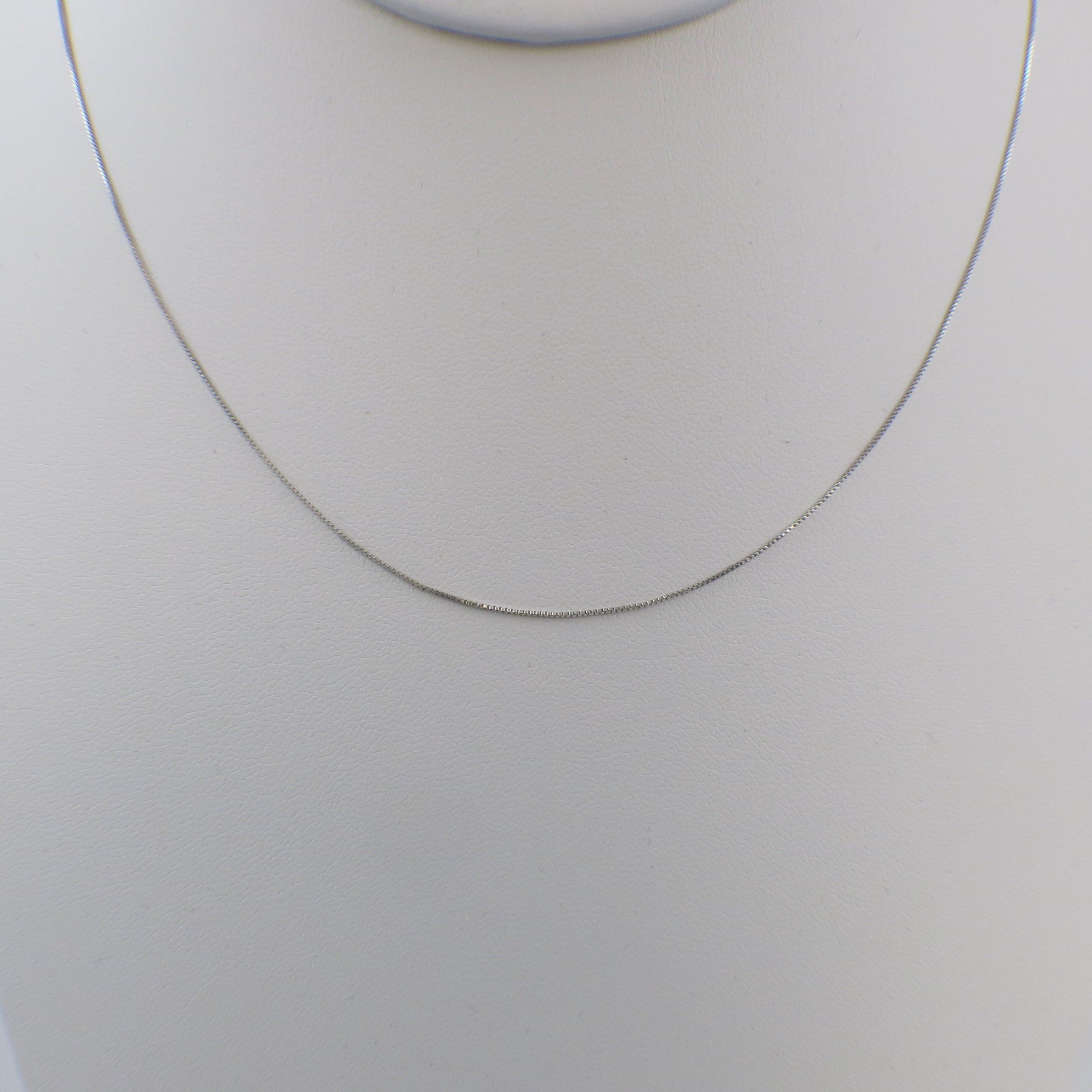 14K white gold box chain necklace, 18 inches long, 0.5mm thickness, by Black Market LLC, displayed on a neutral background.