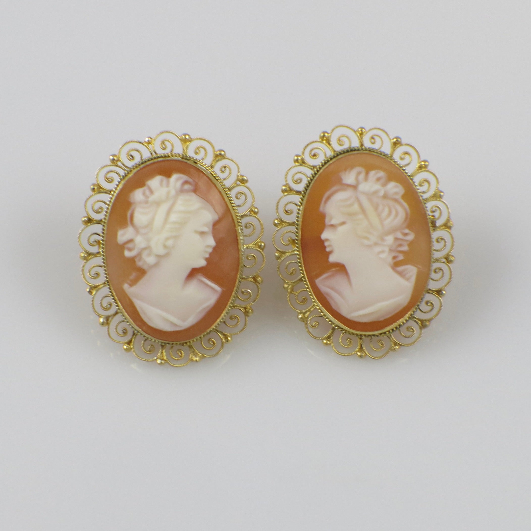 Italian hand-carved shell cameo filigree earrings in 18K gold with intricate metalwork and vintage-inspired design.