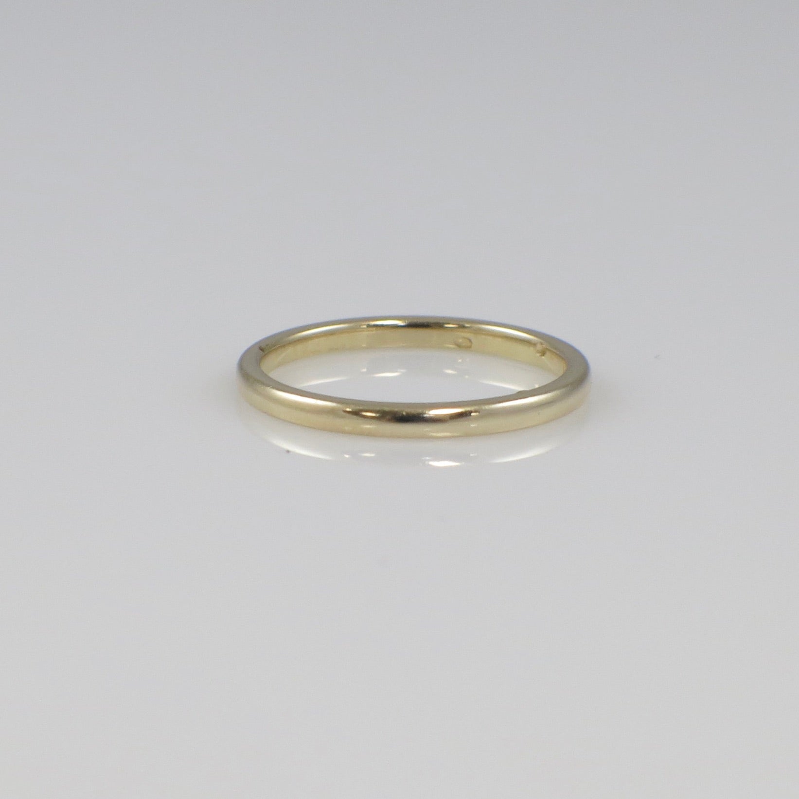 14K yellow gold wedding band, 1.6mm plain gold ring with a smooth polished finish, designed by Black Market LLC.