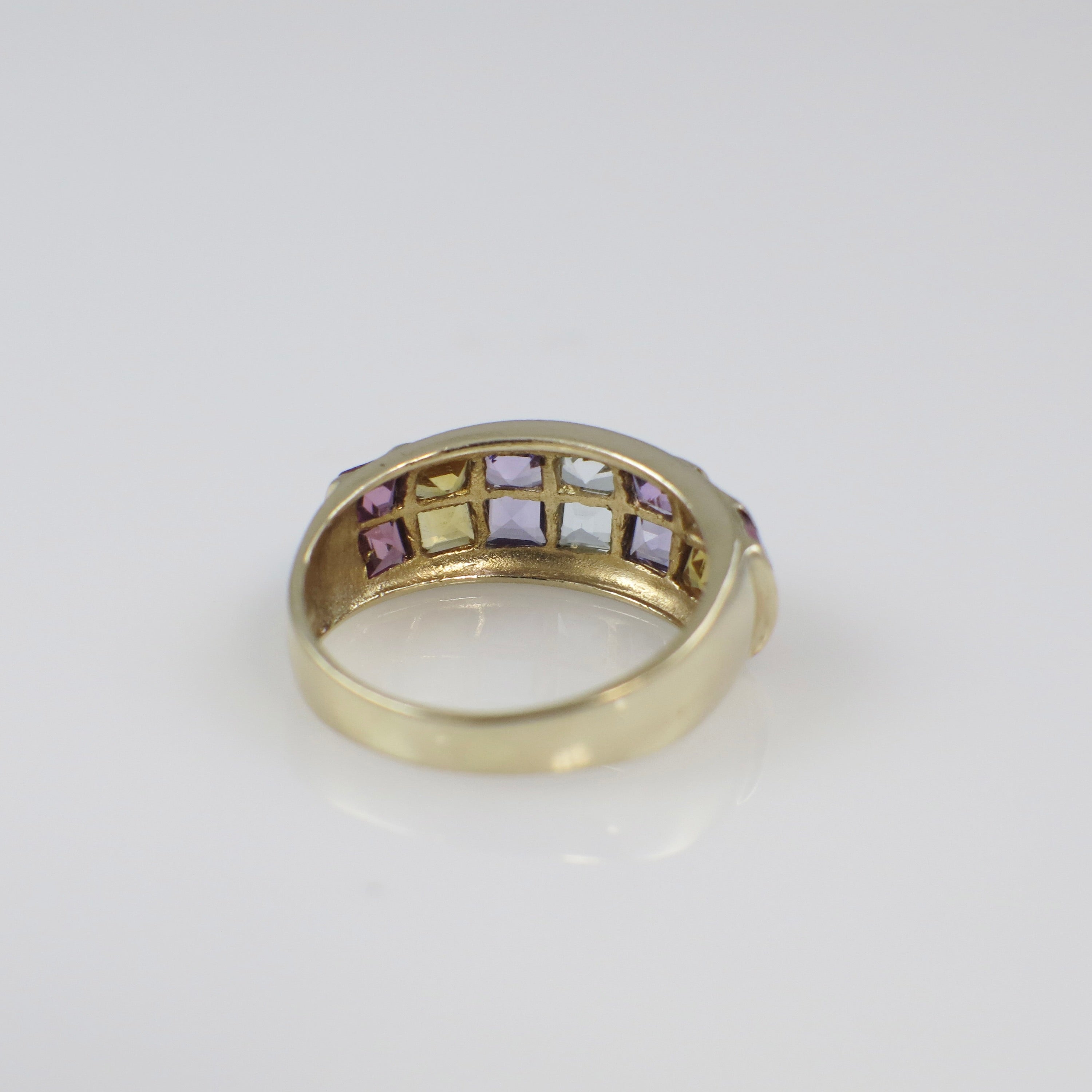 Vintage 14K yellow gold multi-gemstone princess cut ring with colorful gemstones, crafted by Black Market LLC.