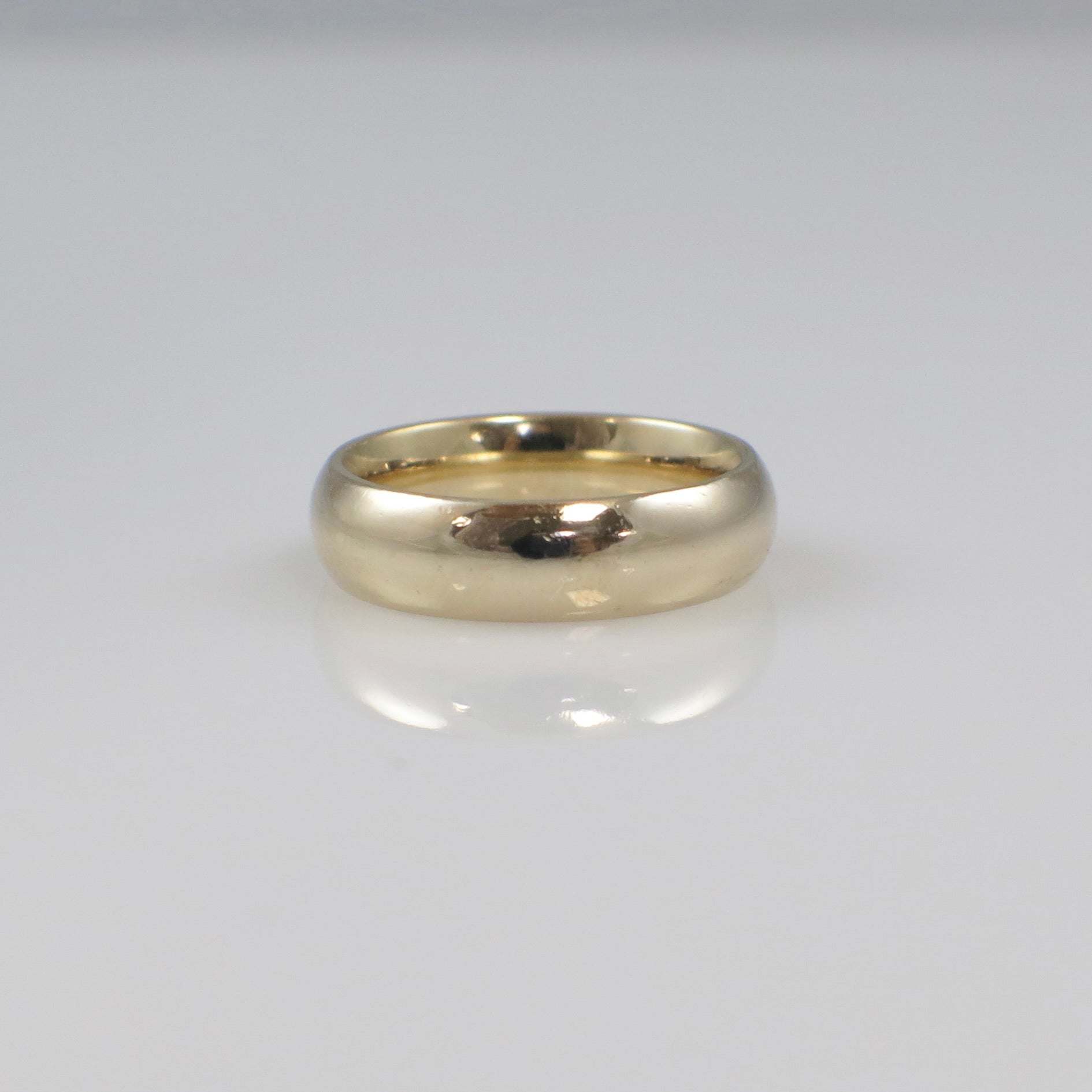 14K yellow gold wedding band ring with 5mm width in size 5, featuring a classic gold band design by Black Market LLC.