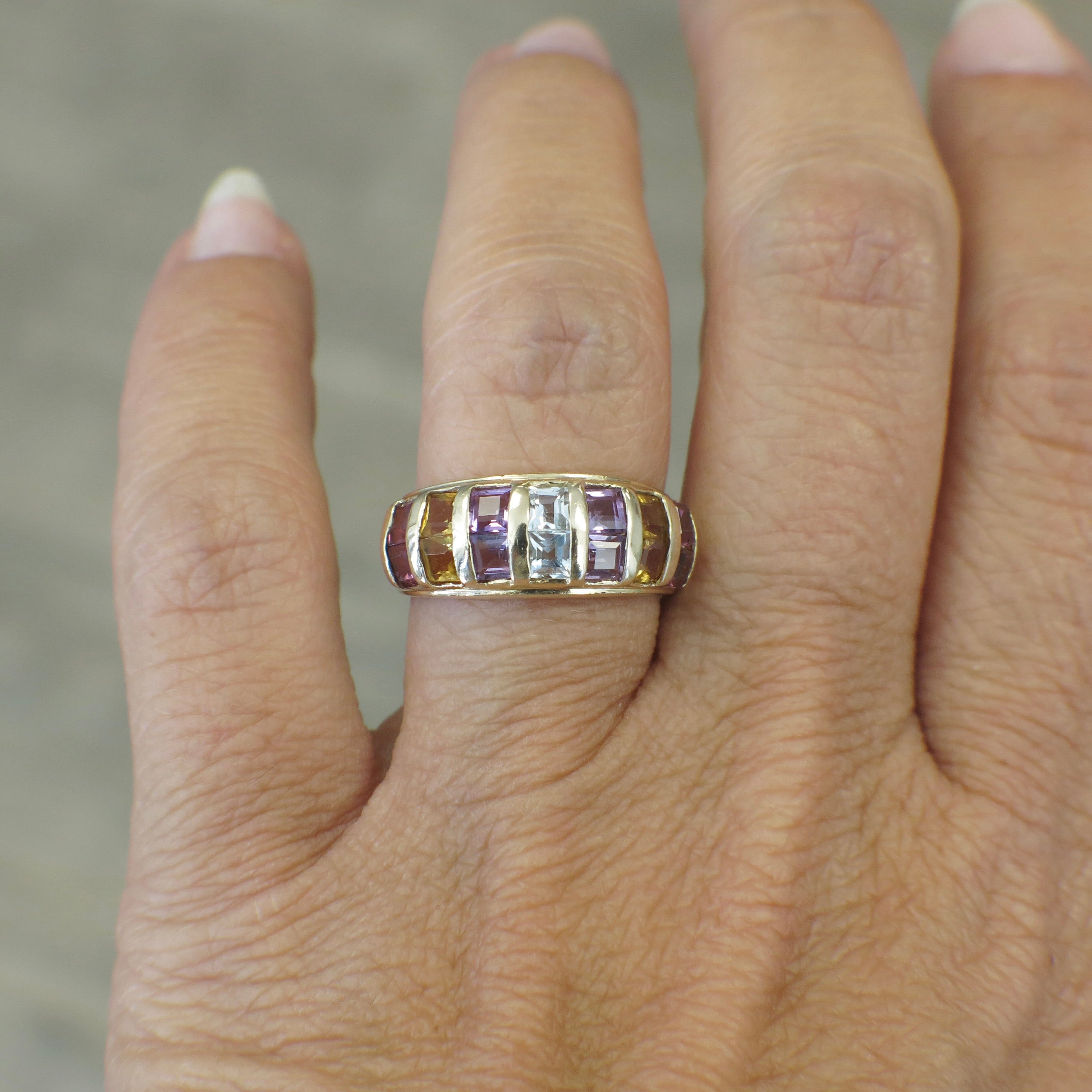 Vintage 14K yellow gold multi-gemstone princess cut ring with intricate design, crafted by Black Market LLC.