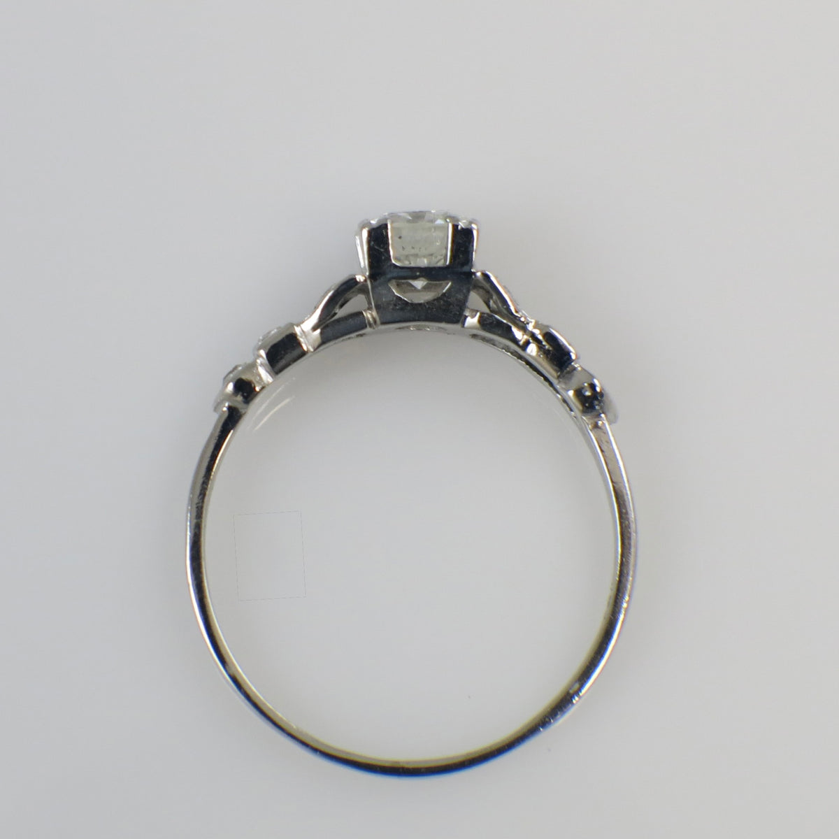 Art Deco platinum diamond engagement ring by Black Market LLC, featuring a 0.63 CTW diamond setting