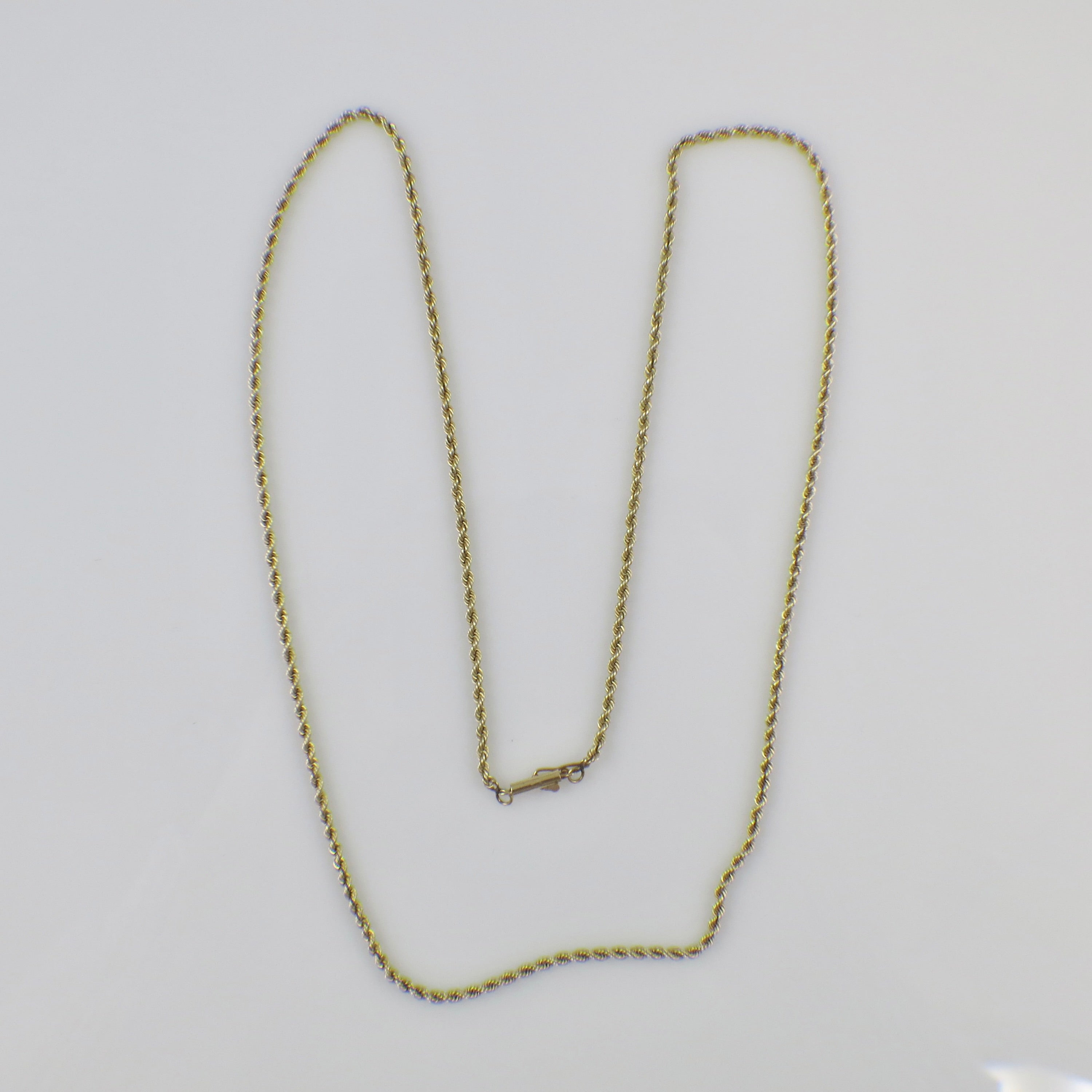14K yellow gold 24-inch 2mm rope chain necklace, solid gold jewelry with intricate twisted design, perfect for everyday wear.