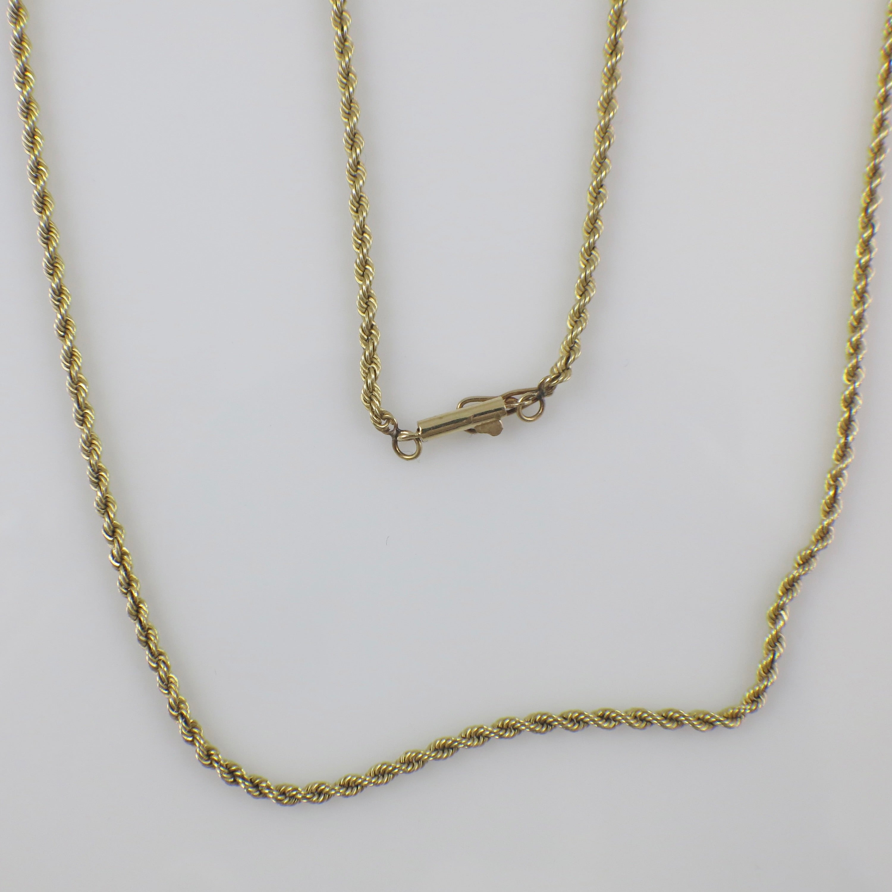 14K yellow gold 24-inch 2mm rope chain necklace with solid gold construction, featuring a detailed twisted rope design.