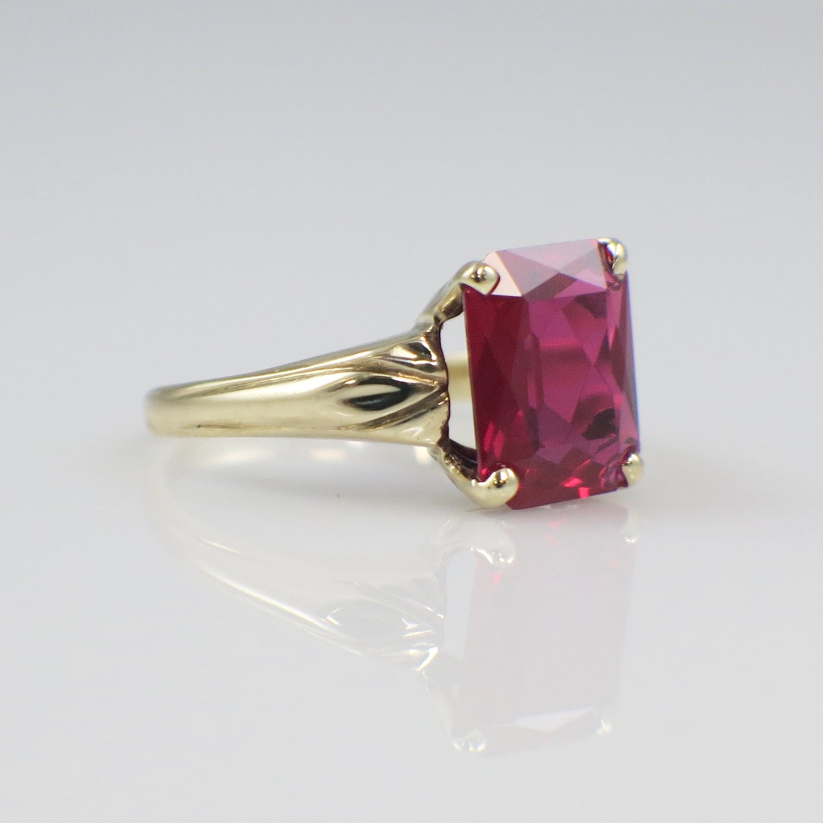10K Yellow Gold Emerald Cut Synthetic Ruby Statement Ring – Size 5.25