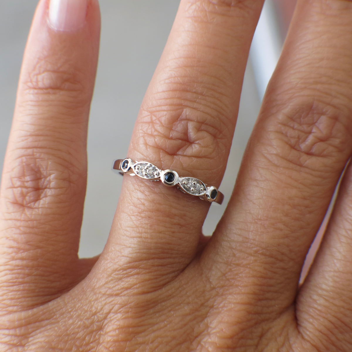Vintage 10K white gold diamond and sapphire band ring with bezel setting, size 6.75, by Black Market LLC