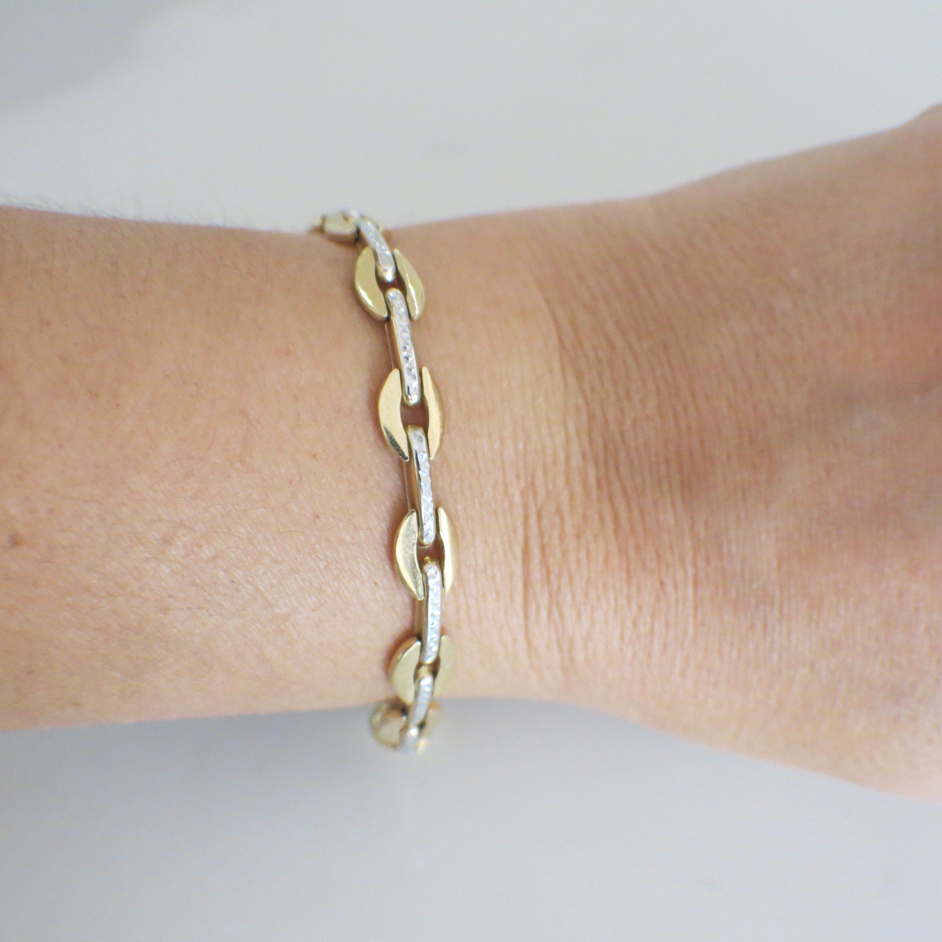 14K Two-Tone Oval Link Bracelet | Yellow & White Gold 7.25 Inch | Textured Center 9.9g - Black Market LLC