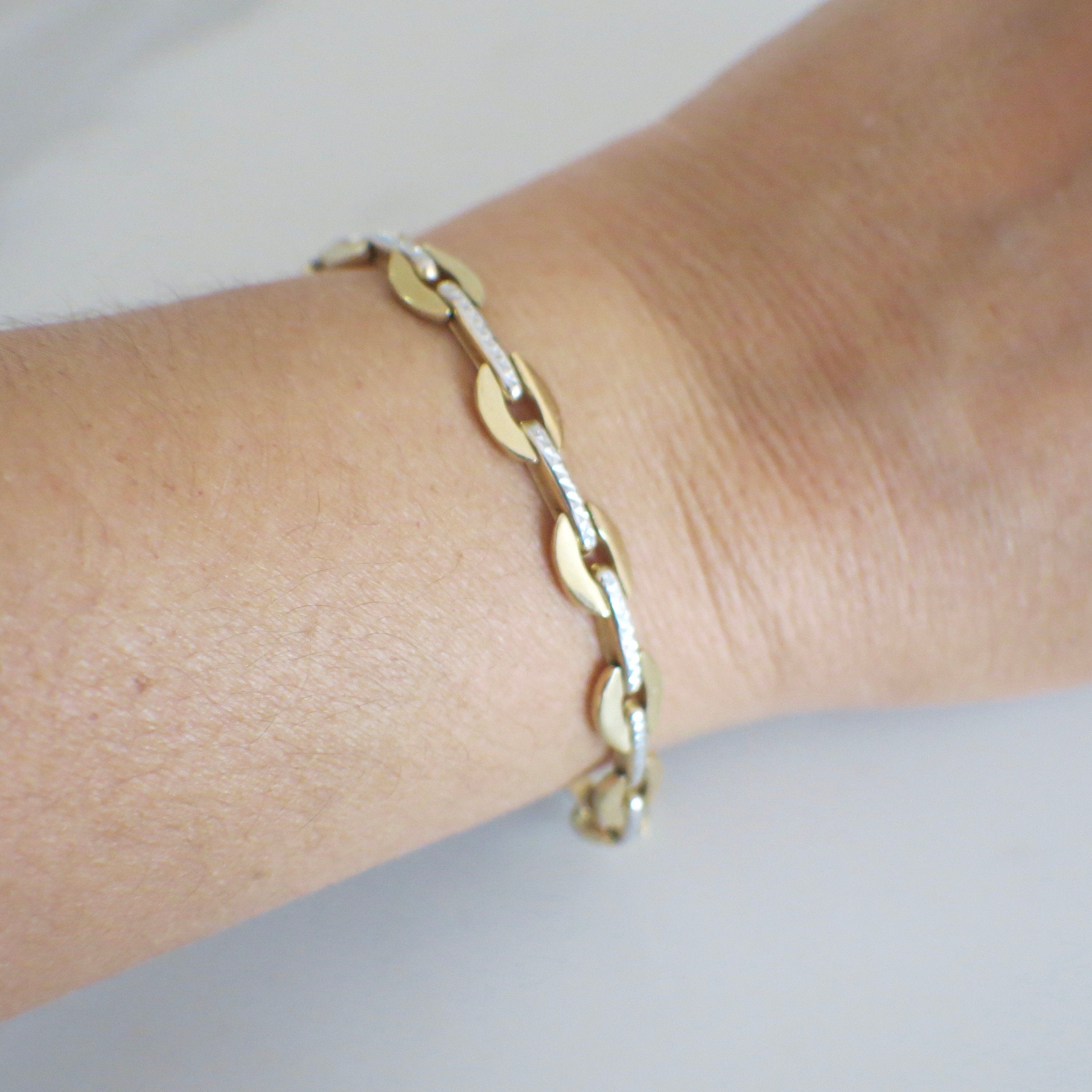 14K Two-Tone Oval Link Bracelet | Yellow & White Gold 7.25 Inch | Textured Center 9.9g - Black Market LLC