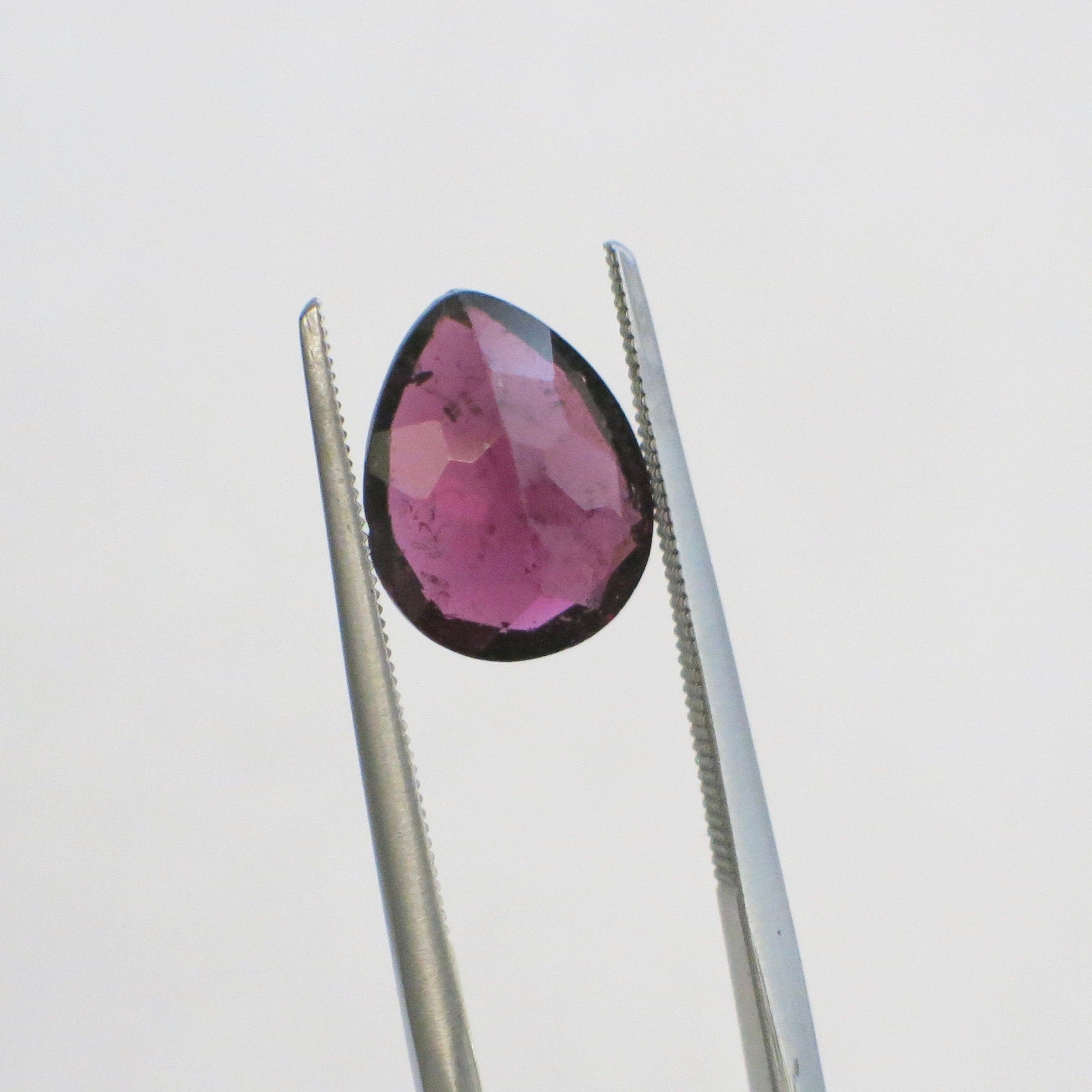 Pear cut Rhodolite garnet loose gemstone, 2.93 carats, 10x8mm, deep purplish-red color, from Black Market LLC.