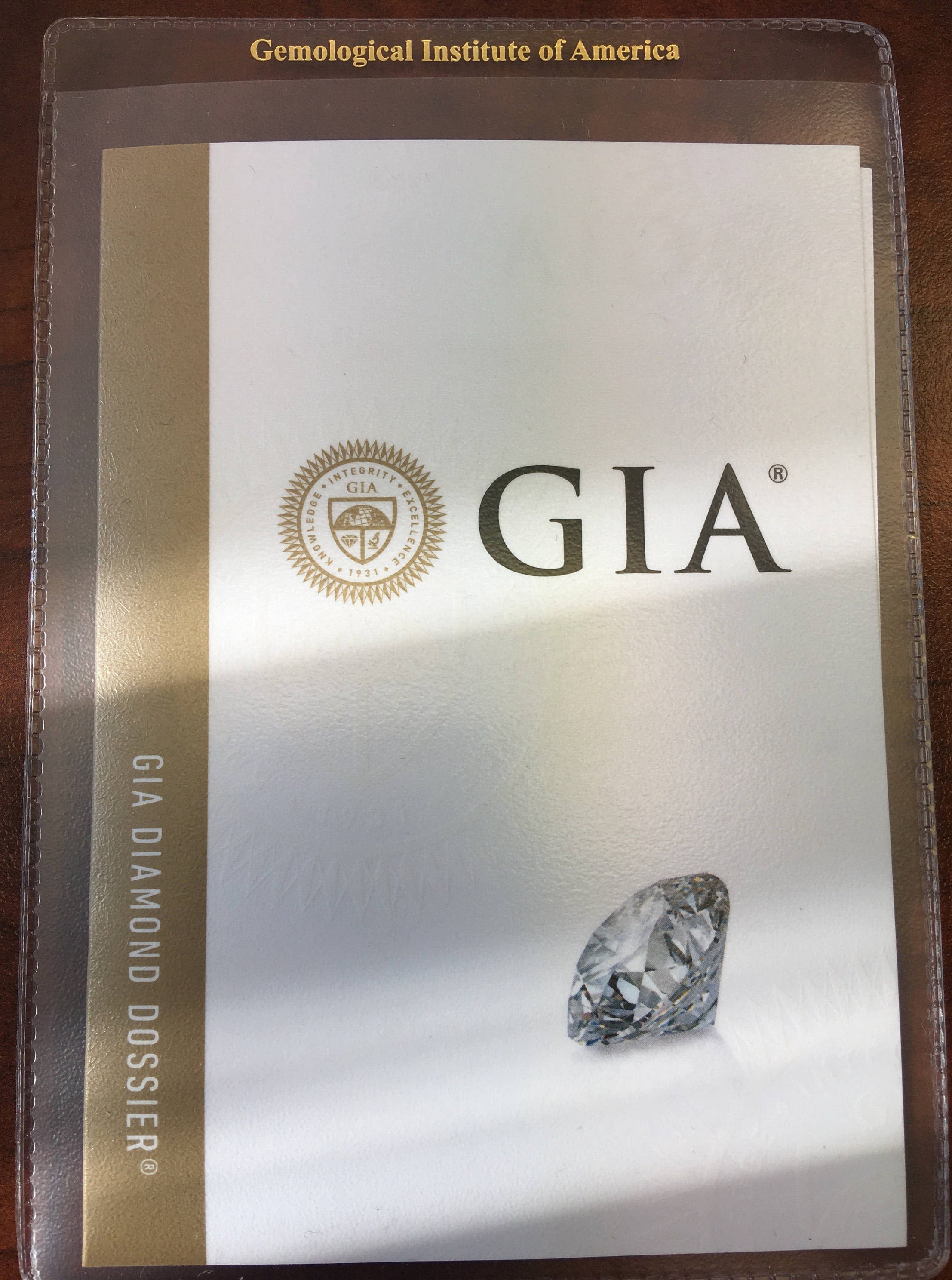 GIA Certified 0.76 CT round brilliant diamond loose stone with VVS1 clarity and I color, from Black Market LLC.