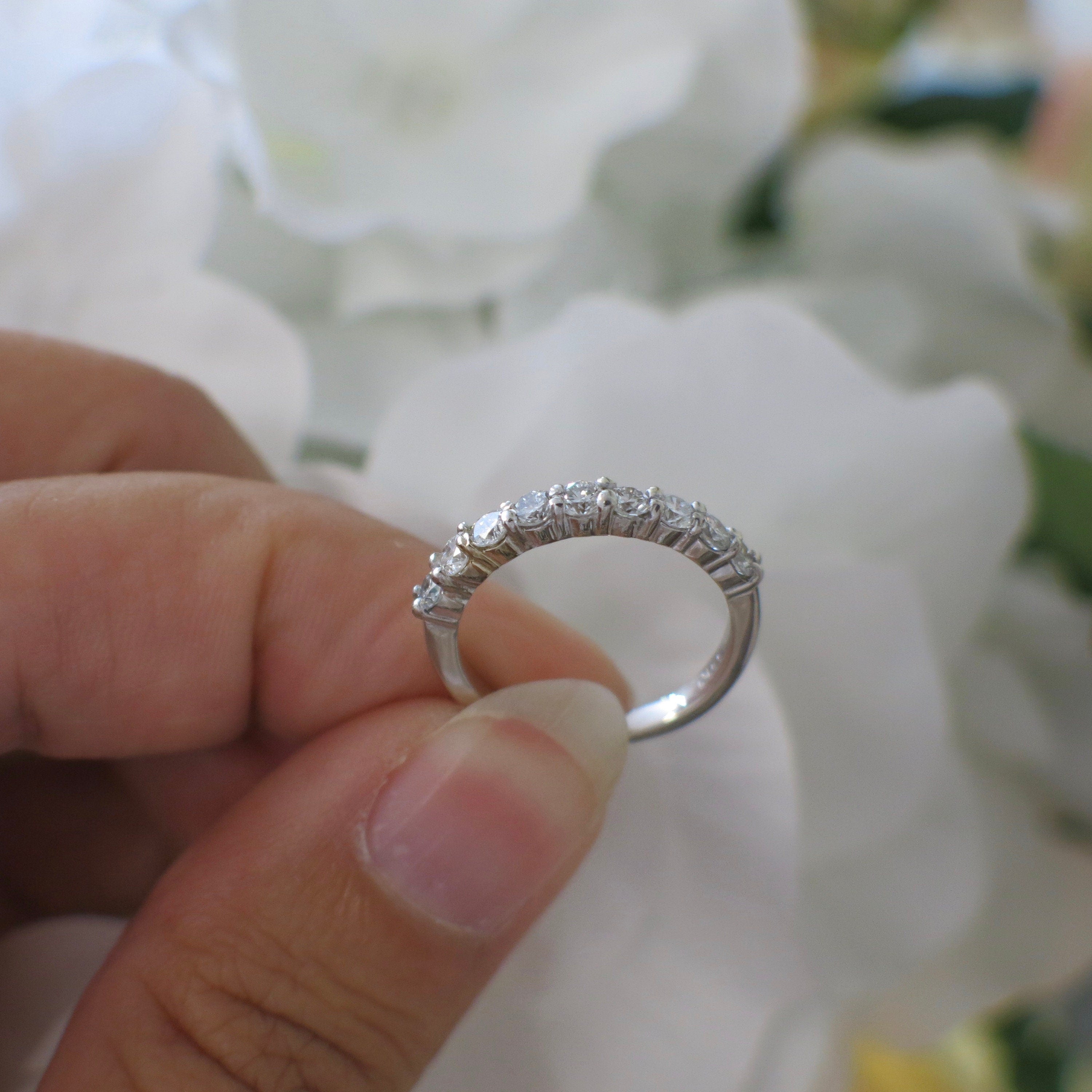 14K white gold 9-stone diamond wedding band with shared prongs, stackable ring featuring 0.45 CTW, size 4.5, by Black Market LLC.