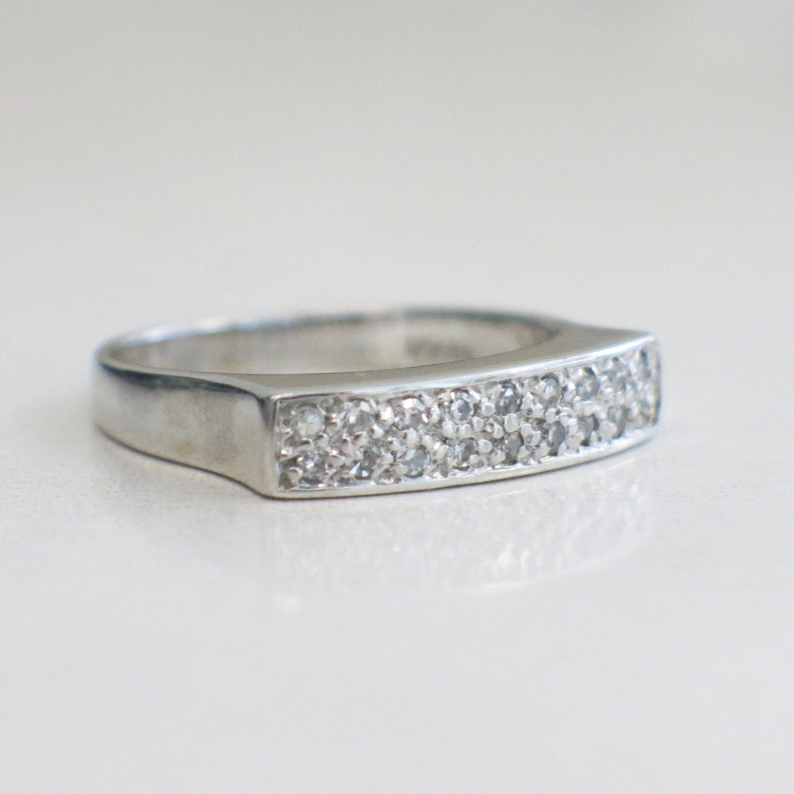 Vintage 14K white gold diamond bar ring with .27 CTW, stackable flat band, size 6.75, by Black Market LLC.