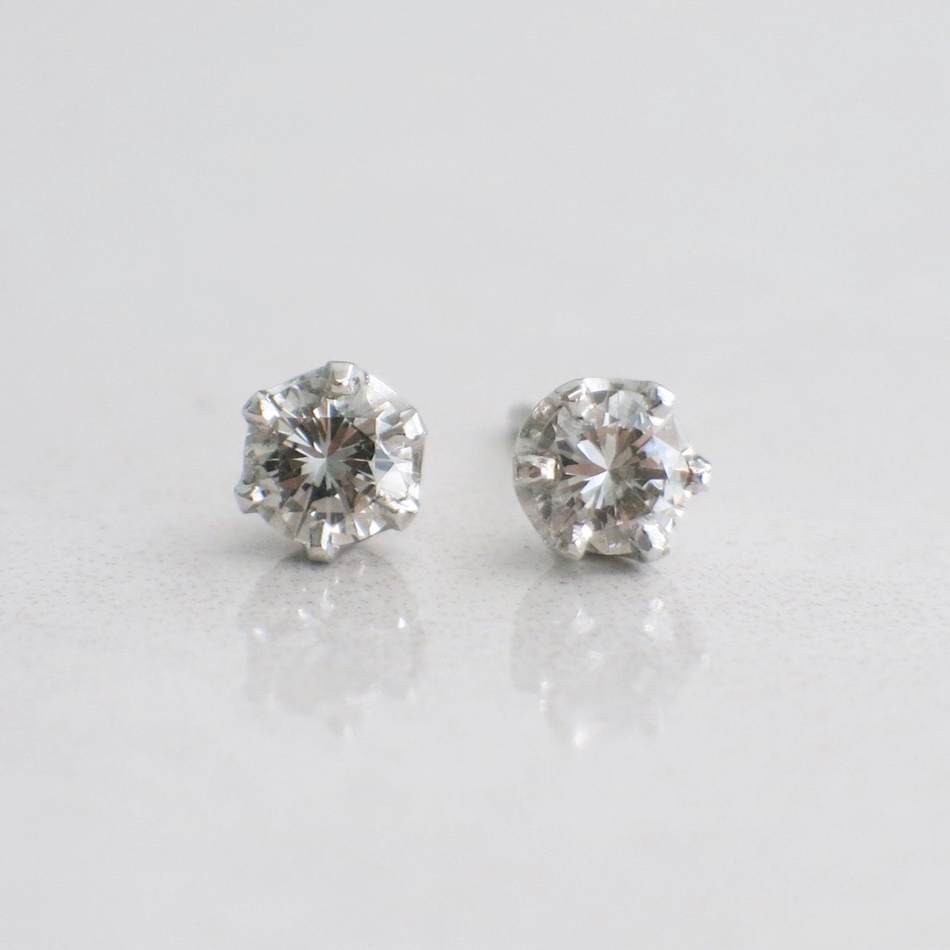 0.68ct Diamond Stud Earrings | 14K White Gold Round Brilliant - Black Market LLC