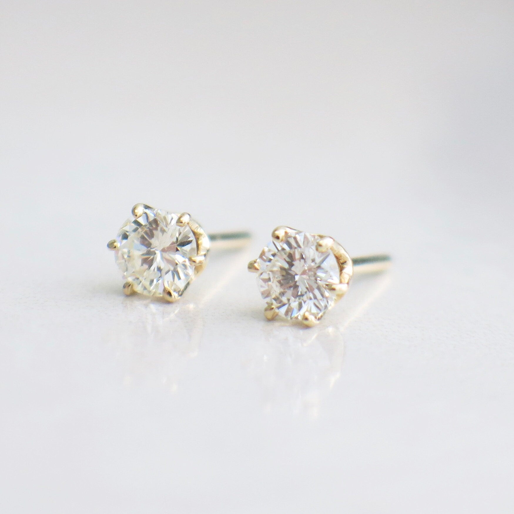 0.80ct diamond stud earrings in 14K yellow gold with six-prong setting, SI2 clarity, I–J color, by Black Market LLC
