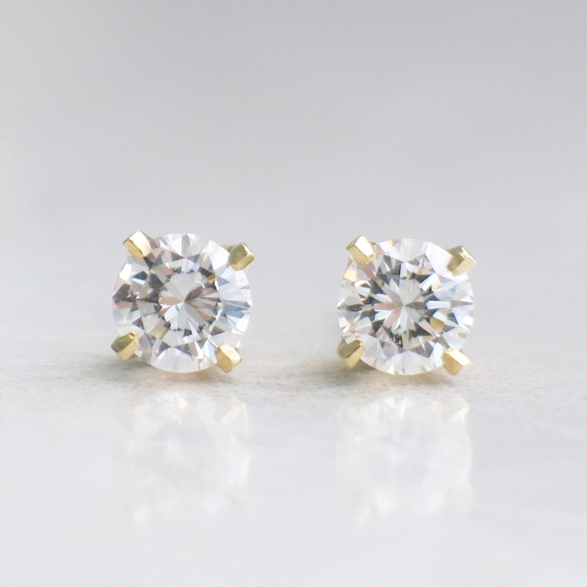 Diamond Stud Earrings – 0.64 CTW Round Brilliant, 14K Yellow Gold, Threaded Backs - Black Market LLC