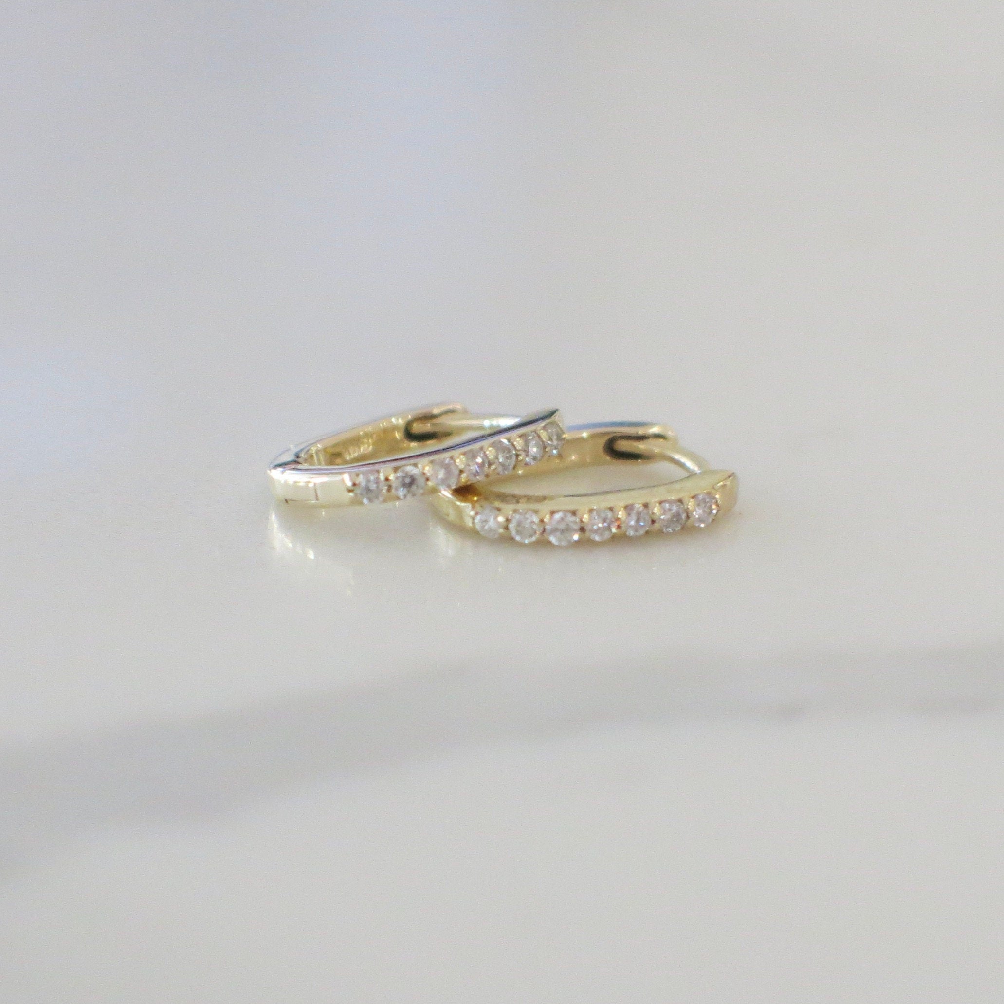 14K Yellow Gold Diamond Mini Hoop Huggie Earrings – 1/8 CTW - Black Market LLC