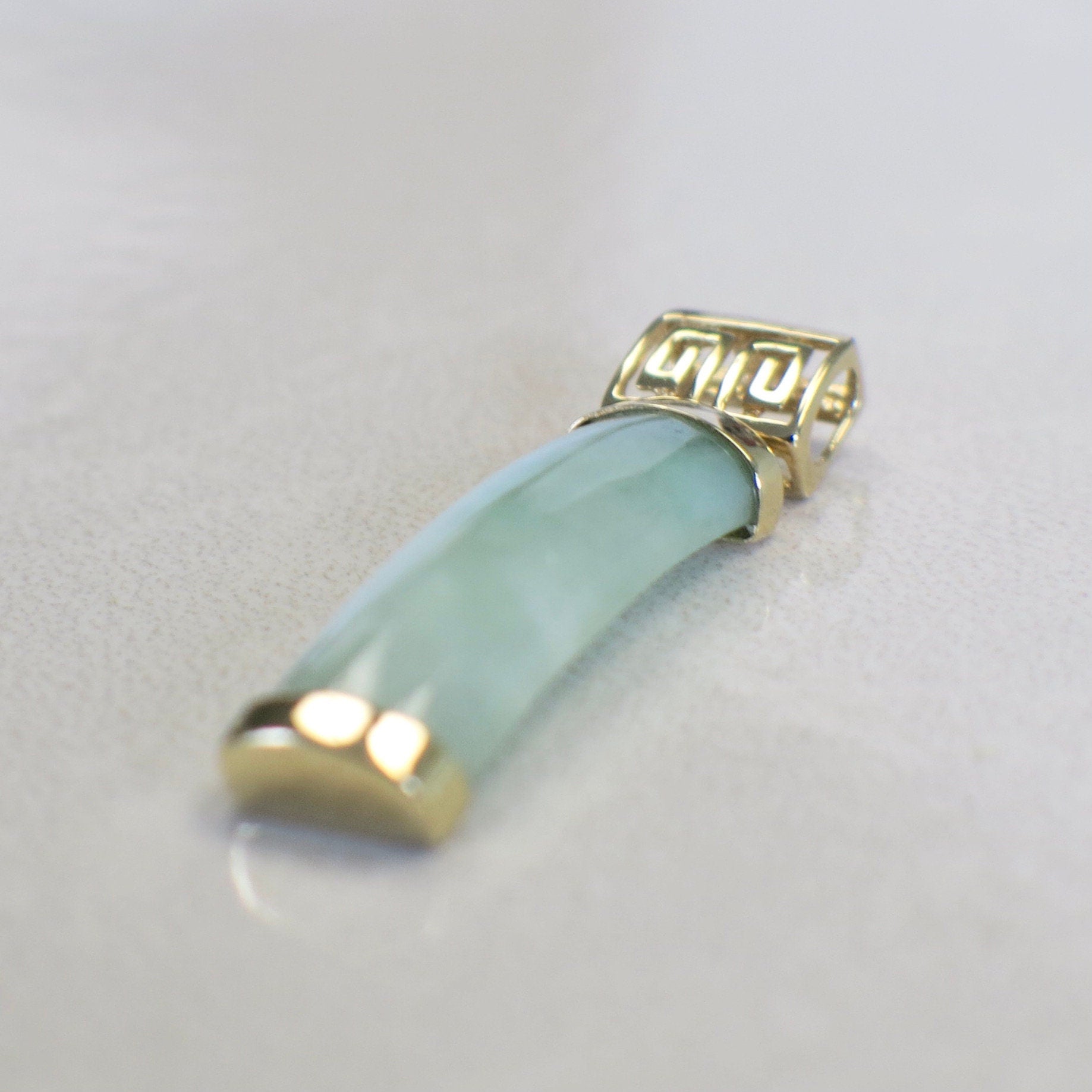 14K yellow gold jade bar pendant on vintage green jade slide necklace, elegant jewelry charm by Black Market LLC.