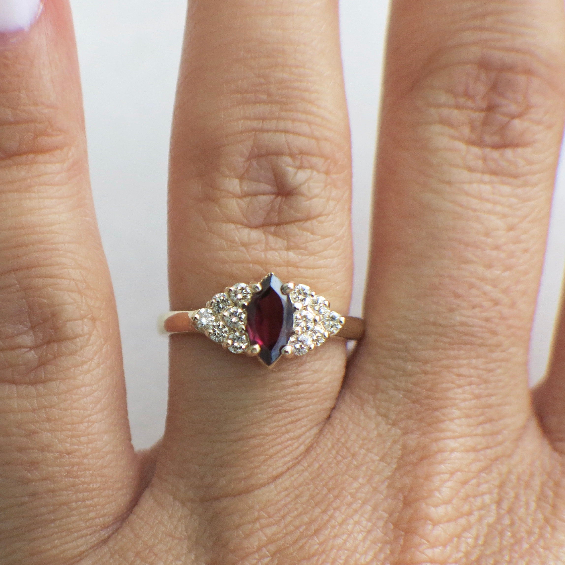 14K gold marquise garnet ring with diamond cluster accents, vintage style, size 6.5, by Black Market LLC.