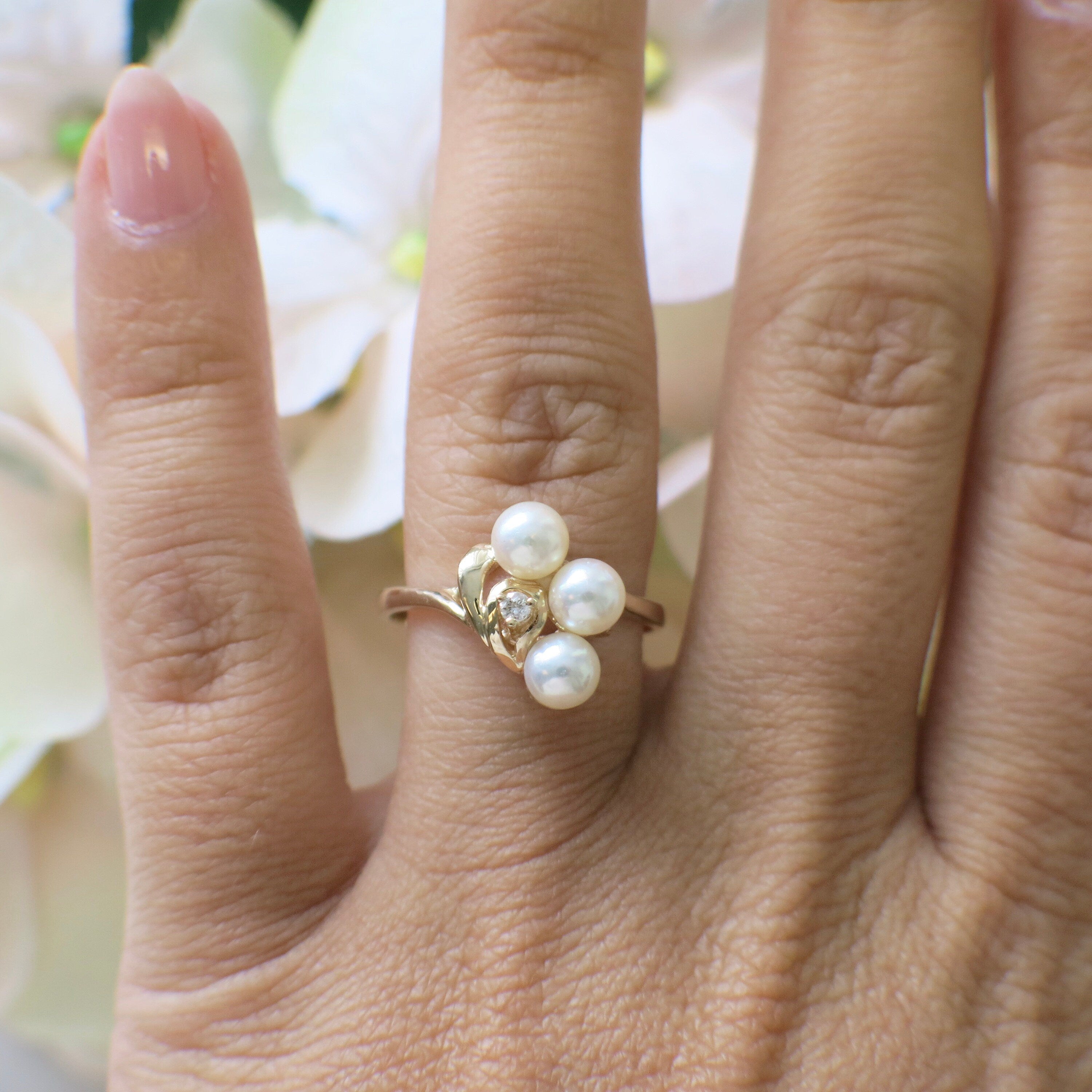 14K gold pearl and diamond vintage ring with a trio of pearls, size 7.5, by Black Market LLC.