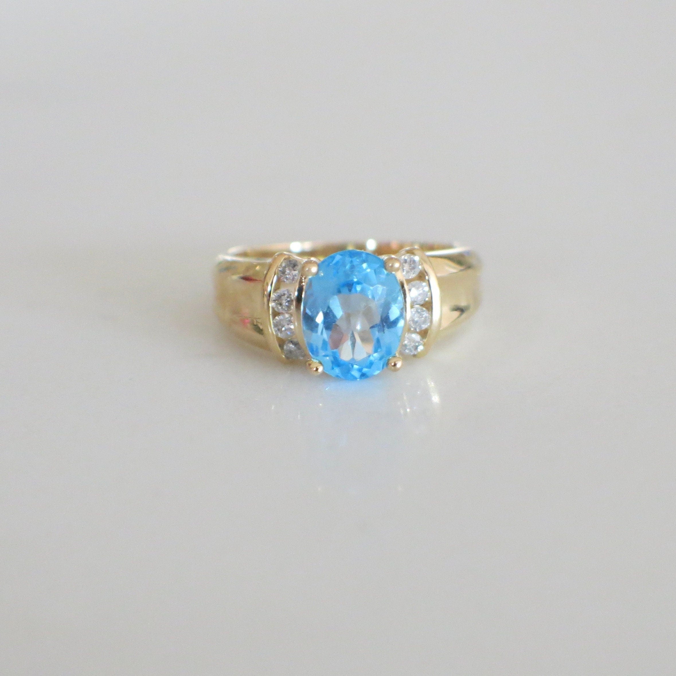 14K Yellow Gold Swiss Blue Topaz and Diamond Oval Ring – Size 6 - Black Market LLC