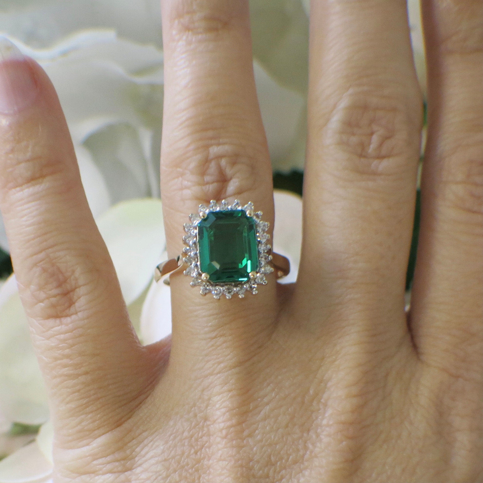 14K yellow gold vintage-inspired synthetic emerald and diamond halo ring, size 8.5, featuring intricate design and sparkling gemstones.