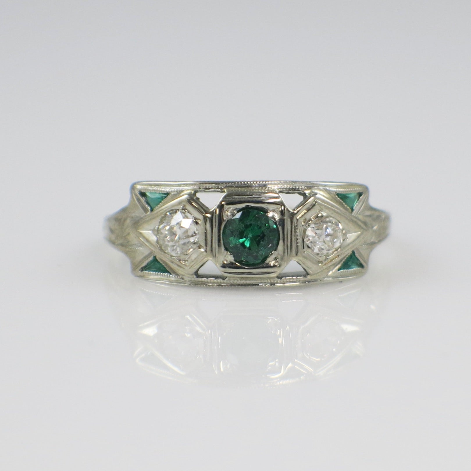 Vintage 14K white gold Art Deco ring with Tsavorite garnet and old European cut diamonds by Black Market LLC.