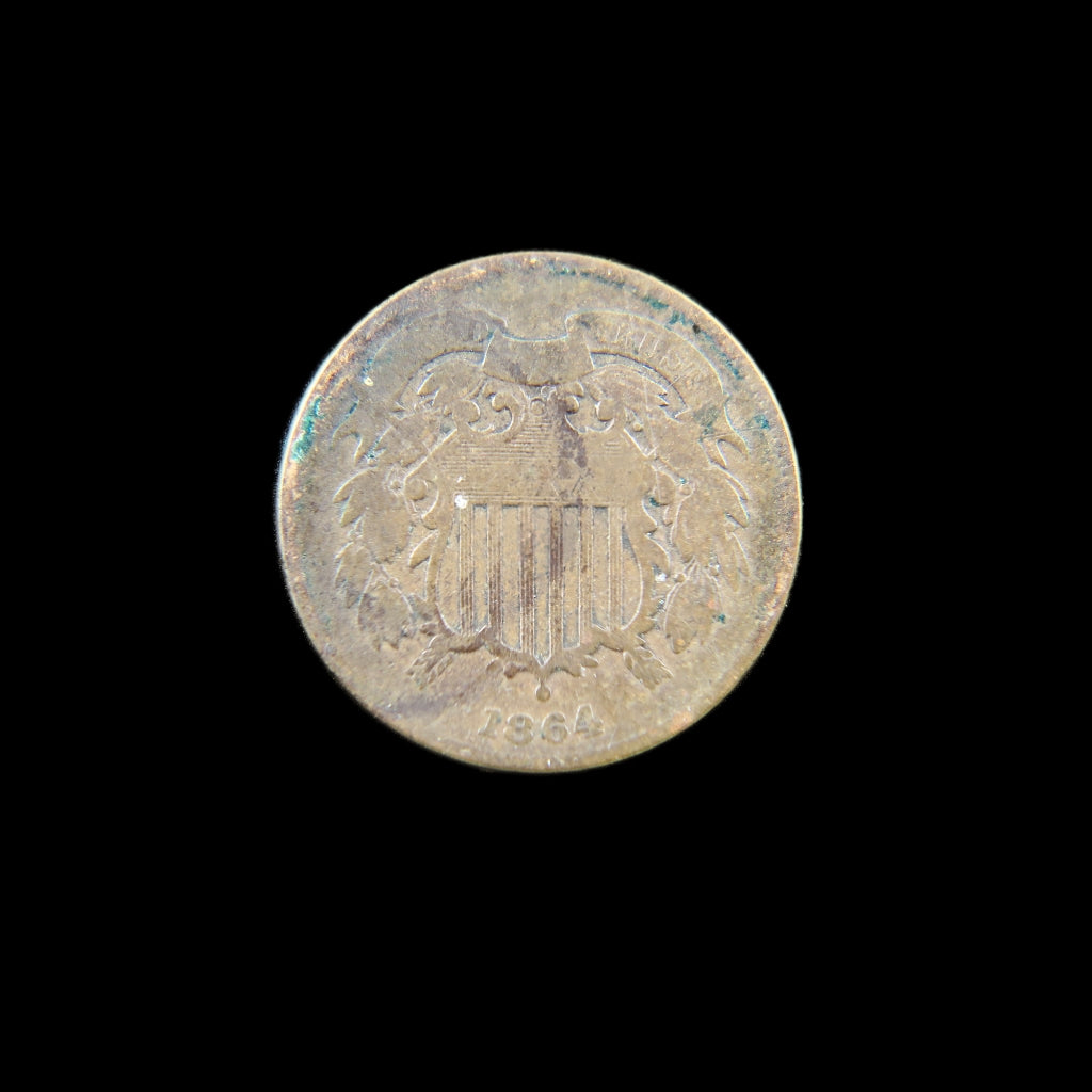 1864 Two Cent Piece by Black Market LLC, raw with environmental damage, large motto, first "IN GOD WE TRUST" U.S. coin.