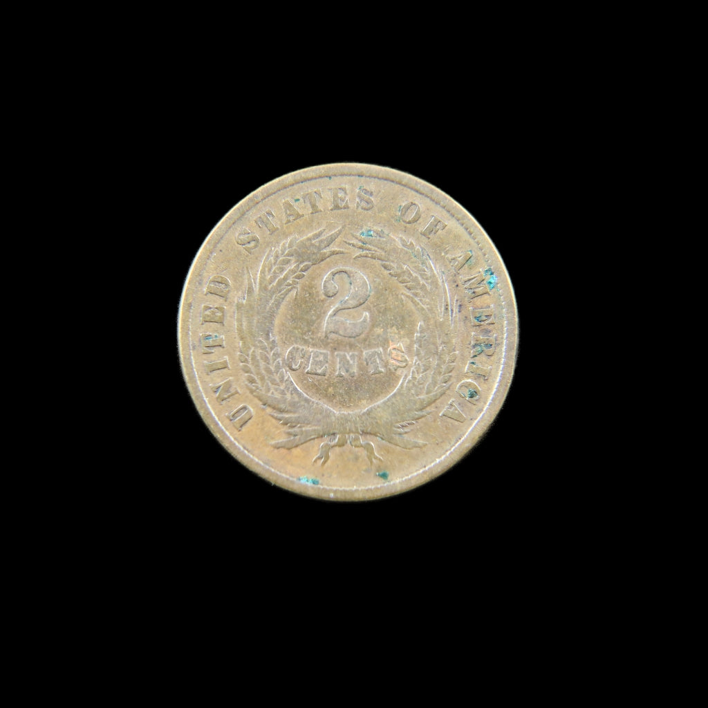 1864 Two Cent Piece by Black Market LLC, raw U.S. coin with large motto and environmental damage, featuring first "IN GOD WE TRUST" inscription.