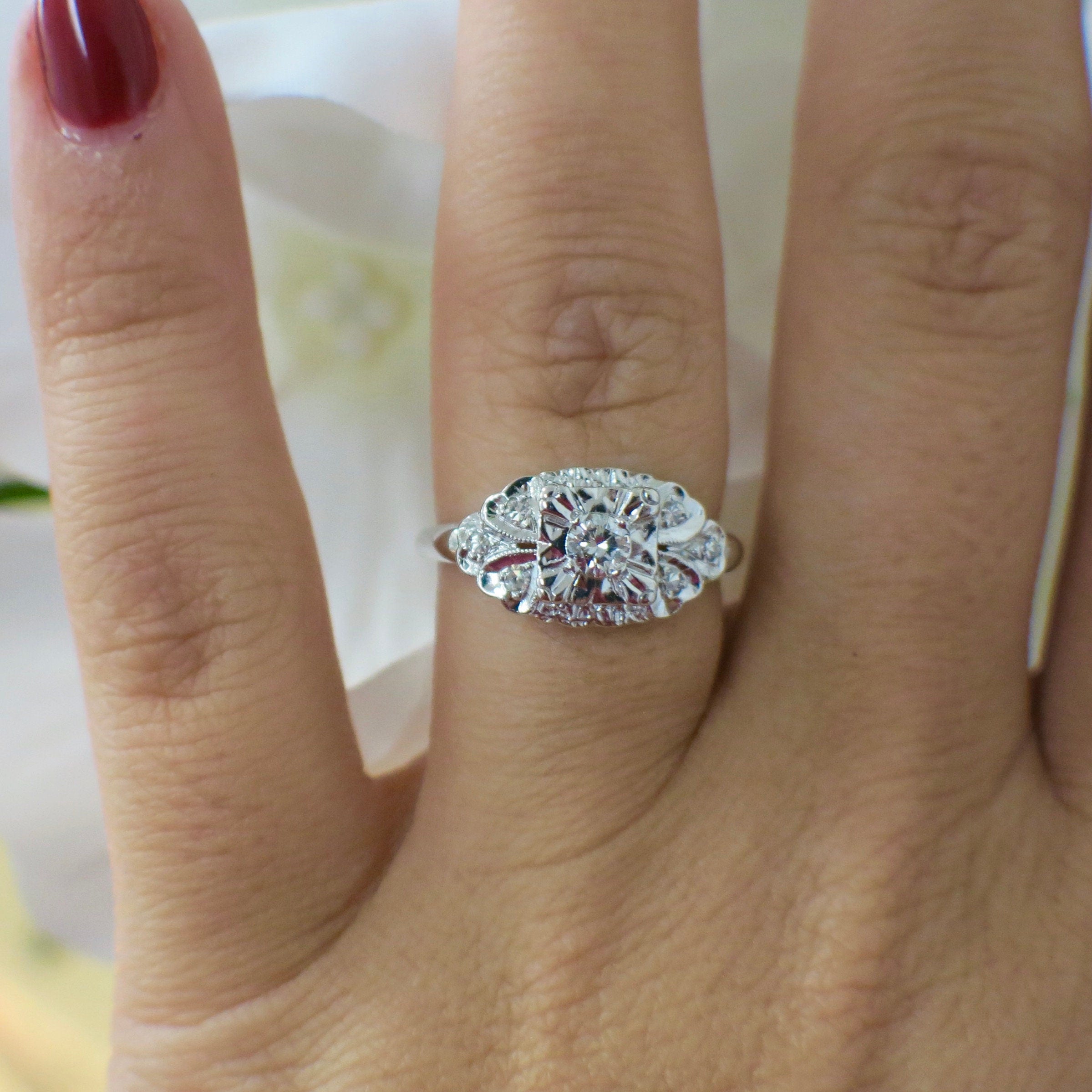 Vintage 14K white gold diamond engagement ring with milgrain detail, size 5.75, from Black Market LLC.