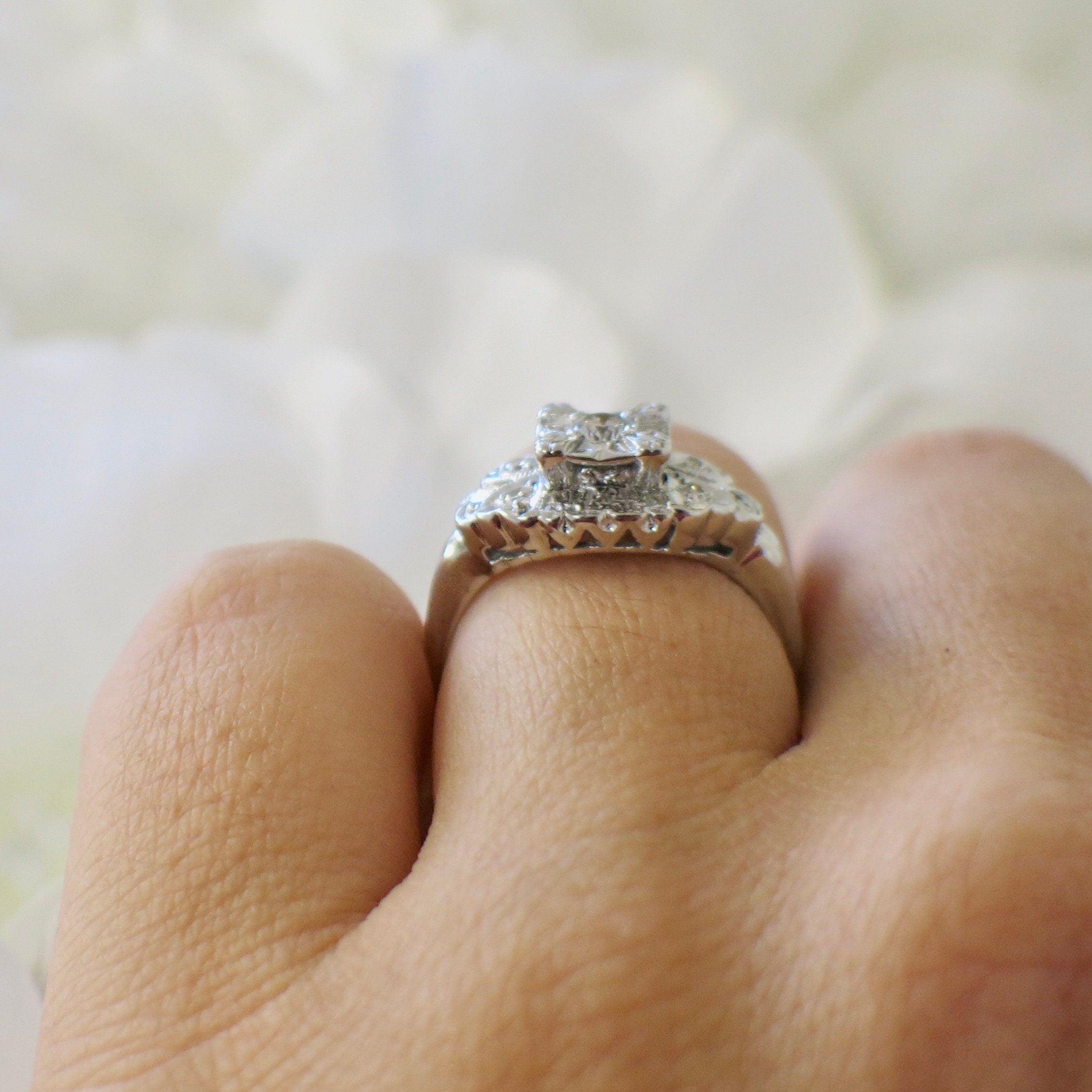 Vintage 14K white gold diamond engagement ring with milgrain detailing, size 5.75, by Black Market LLC.