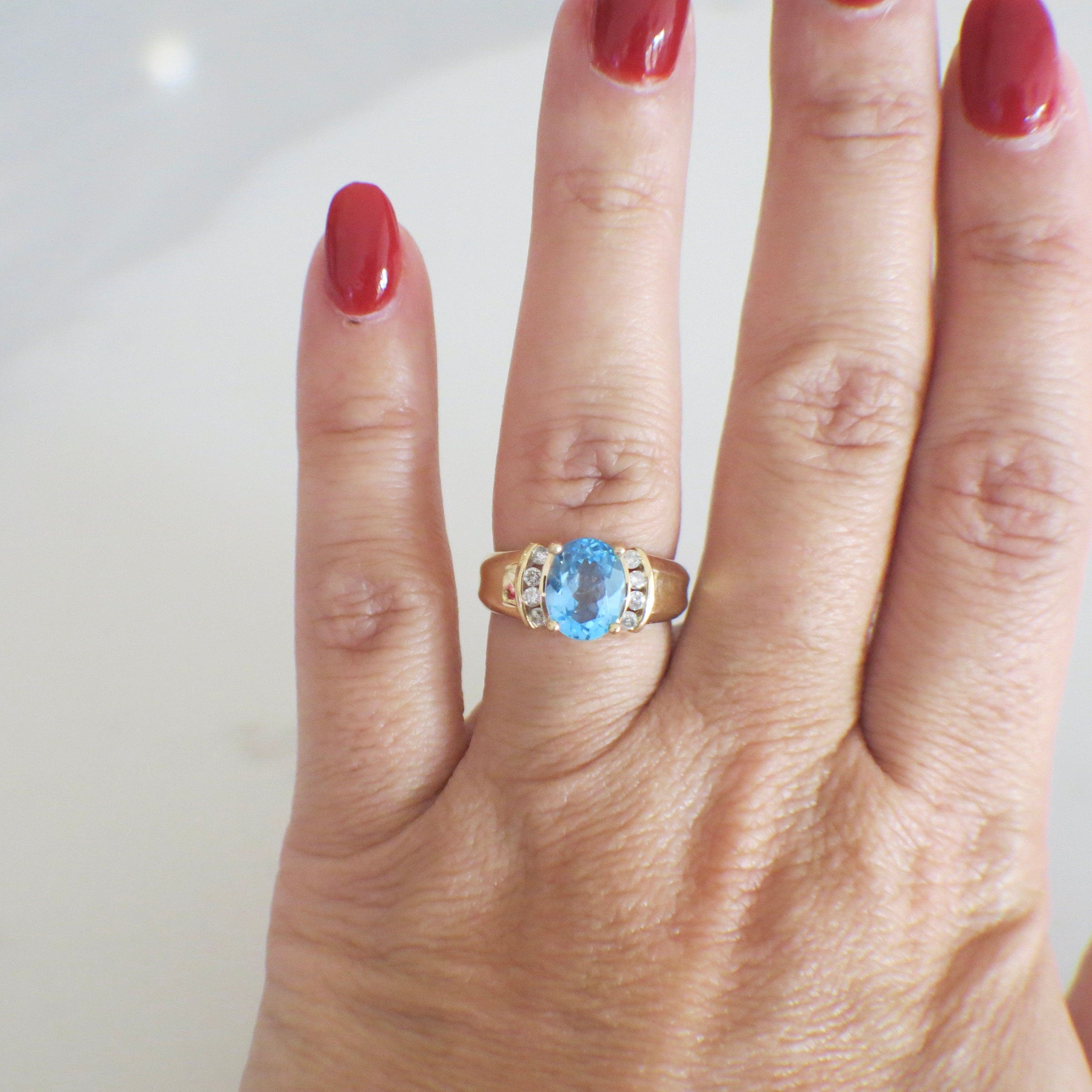 14K Yellow Gold Swiss Blue Topaz and Diamond Oval Ring – Size 6 - Black Market LLC