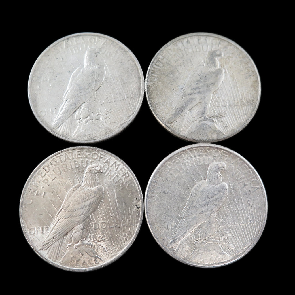 Circulated Peace Silver Dollar coin from 1921-1935, showing detailed reverse design with silver finish, by Black Market LLC.