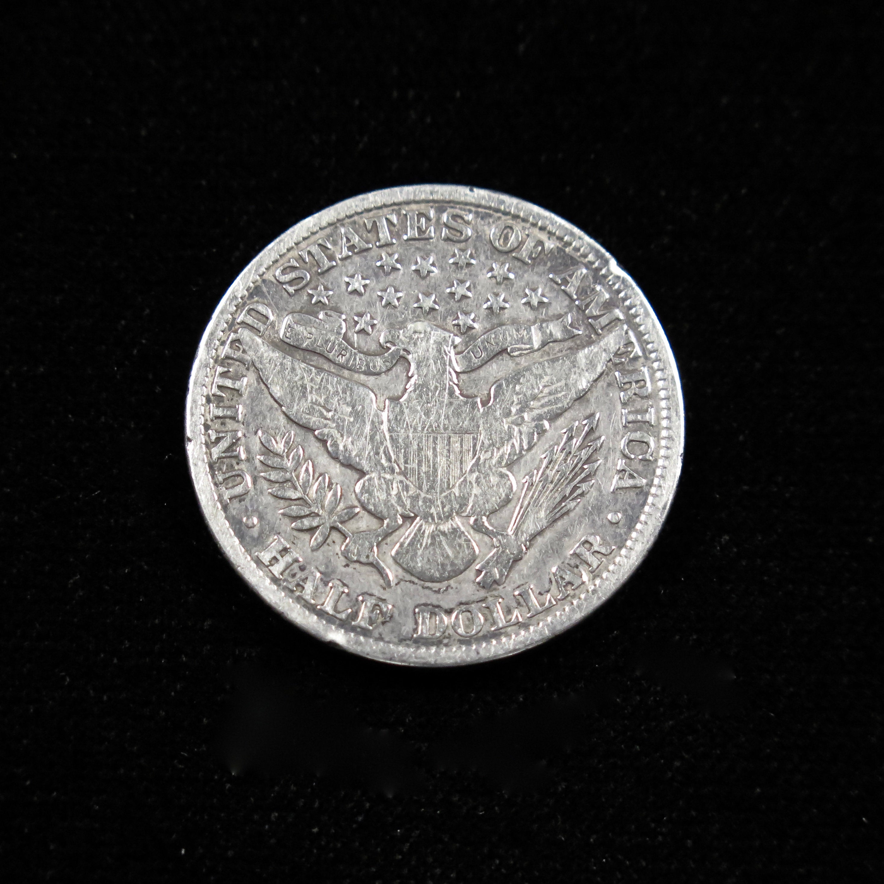 1904 Barber Half Dollar coin by Black Market LLC, fine condition, raw U.S. silver half dollar from the turn of the century.