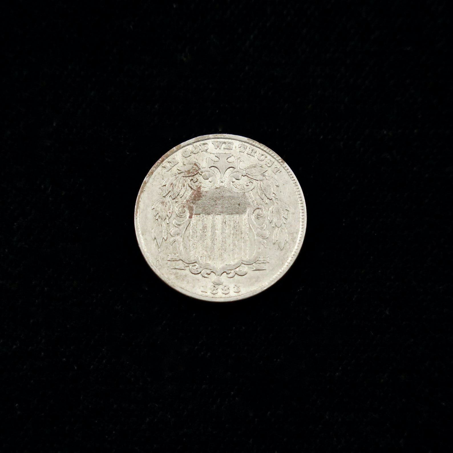 1883 Shield Nickel MS details, slight environmental damage, final year U.S. coin, raw nickel from Black Market LLC.