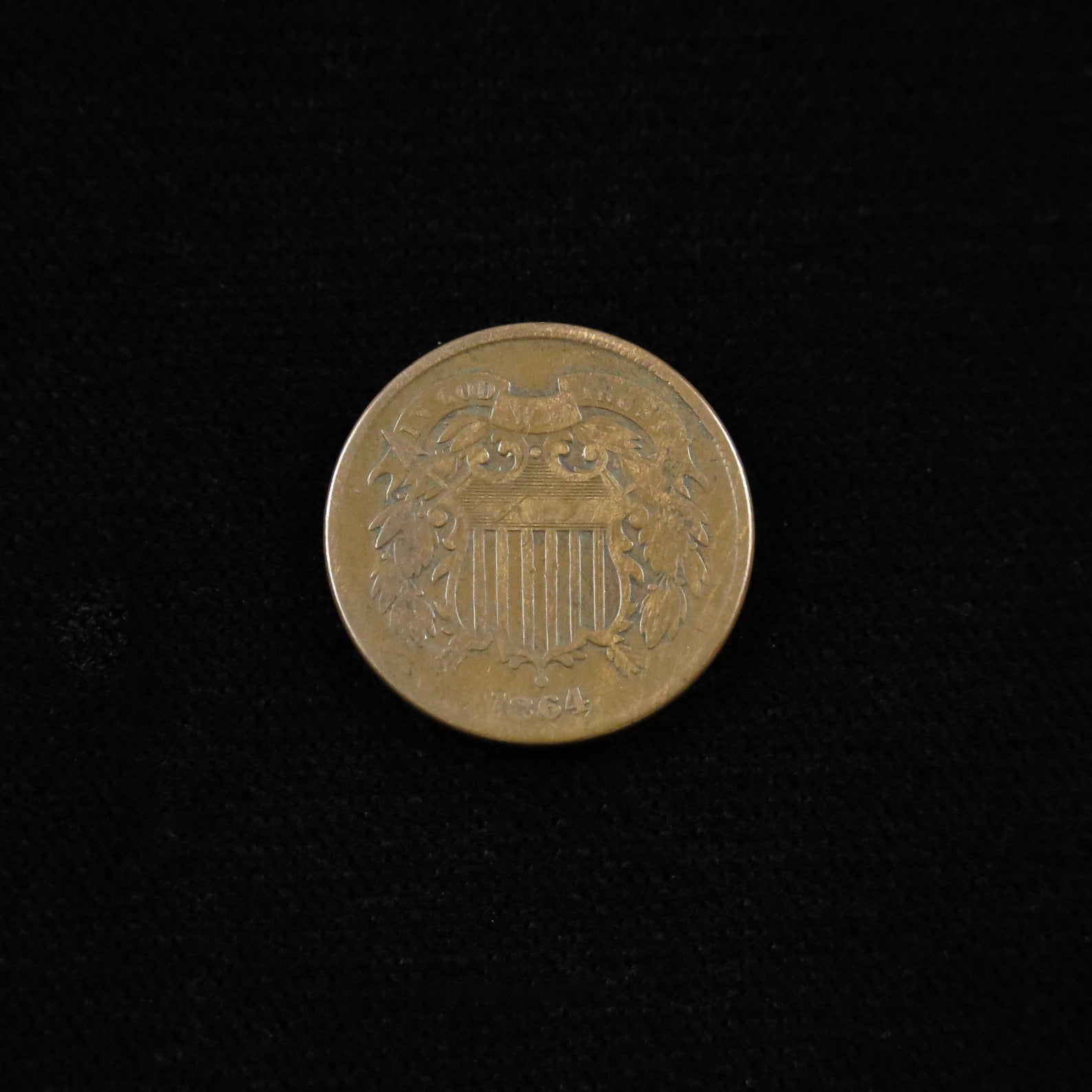 1864 Two Cent Piece with large motto and rotated reverse die, raw Civil War rarity, detailed view of coin's obverse and reverse.