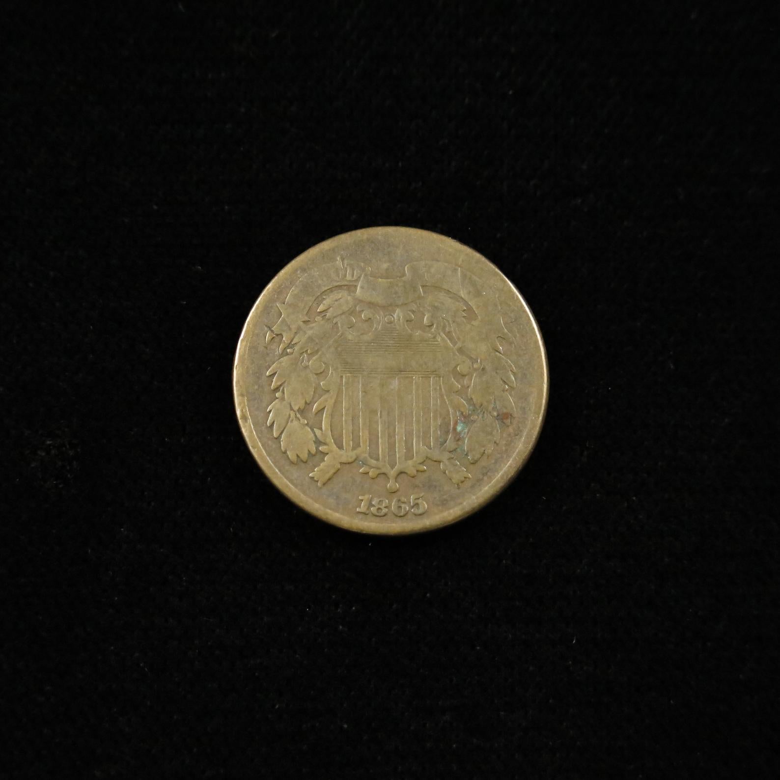 1865 Two Cent Piece by Black Market LLC, plain 5, raw historic U.S. copper coin from the Civil War era, showing detailed coin surface.