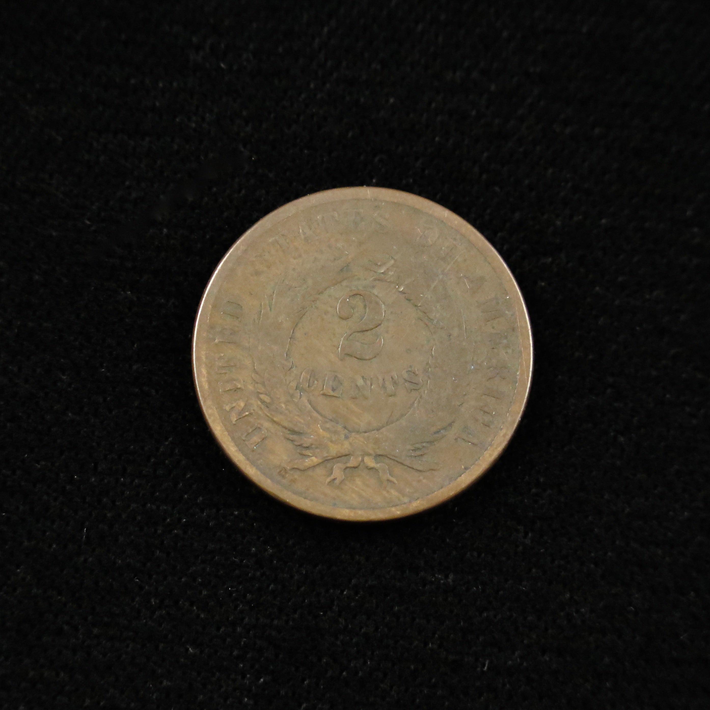 1867 Two Cent Piece by Black Market LLC, raw historic U.S. copper coin from the late Civil War era, detailed close-up image