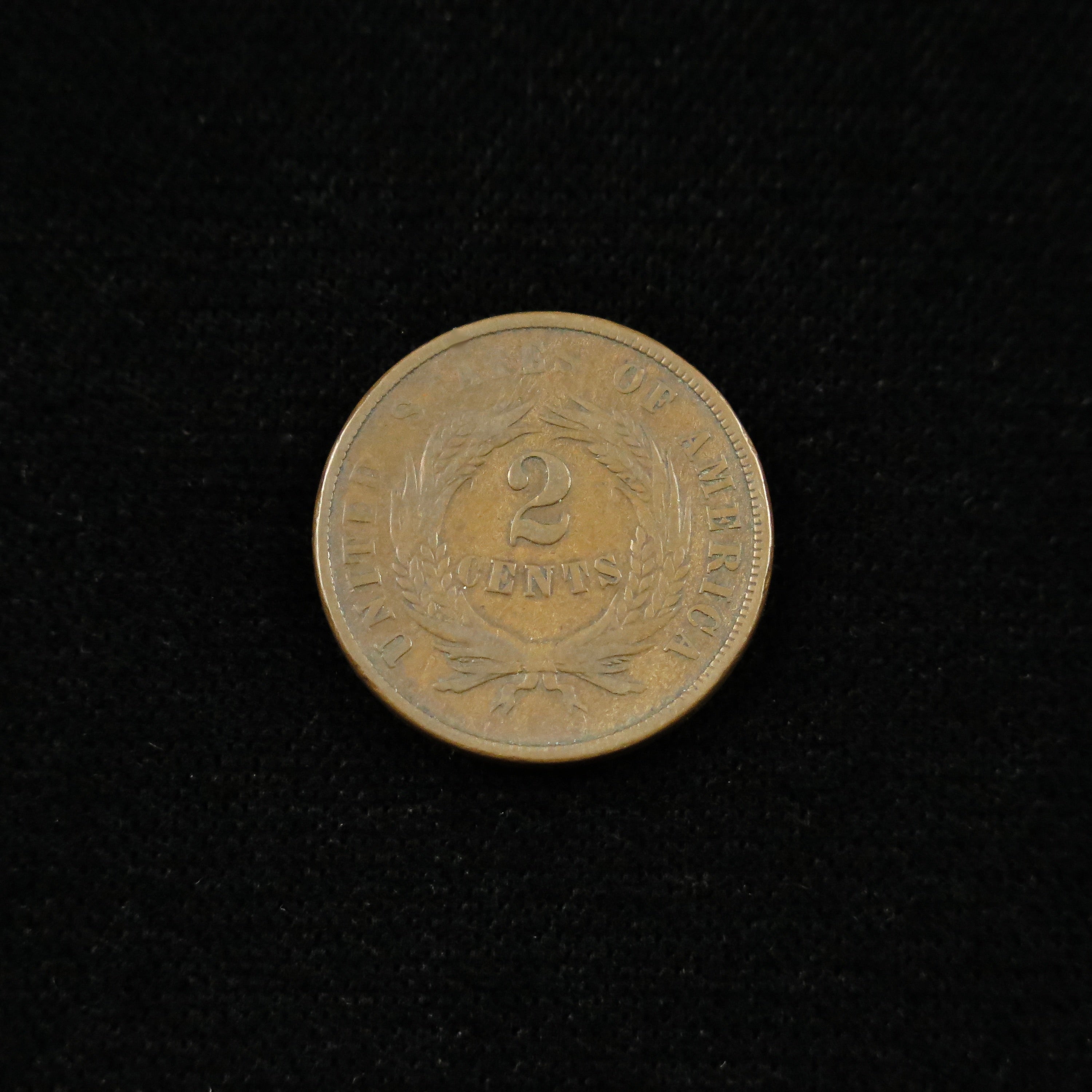 1868 Two Cent Piece by Black Market LLC, fine raw U.S. copper coin, historic post-Civil War two-cent coin with detailed design.