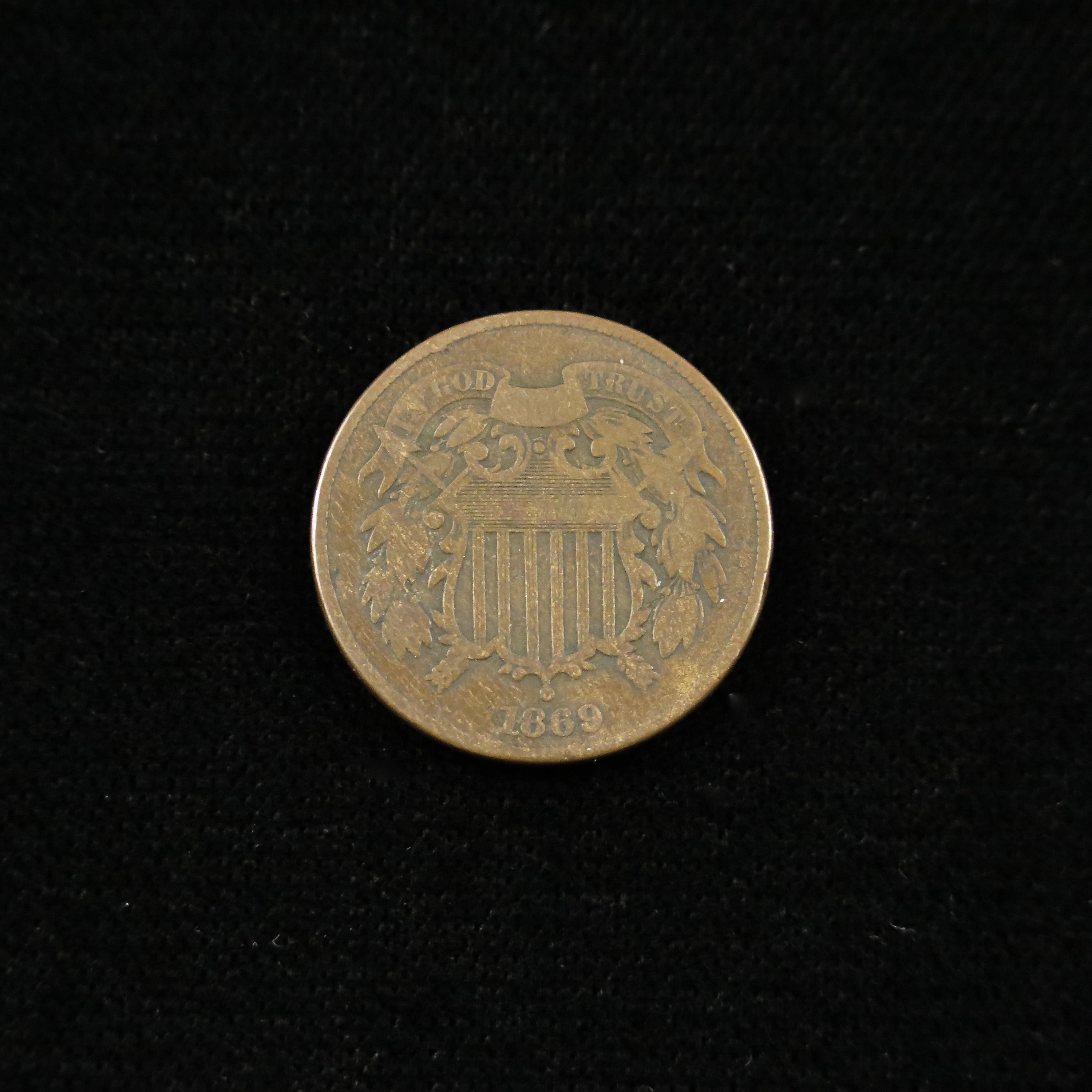 1869 Two Cent U.S. copper coin in raw condition, historic and scarce late-date type from Black Market LLC.
