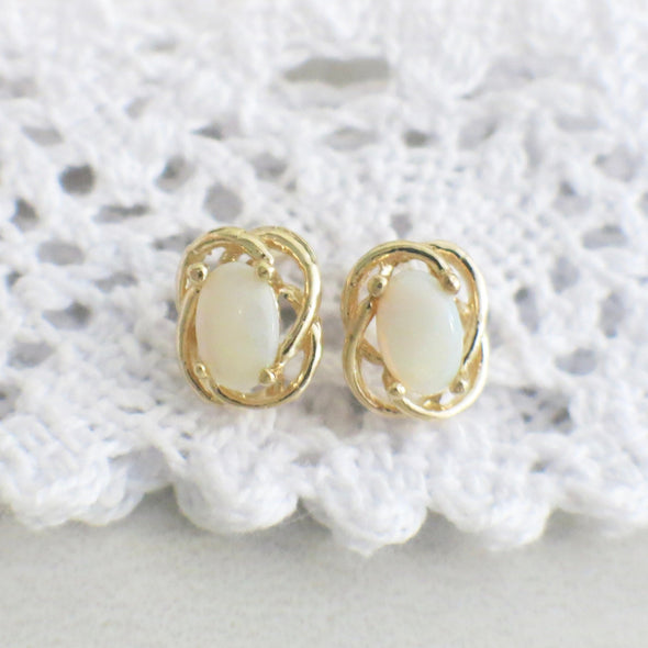 14K Yellow Gold White Opal Stud Earrings | Vintage Oval Cabochon Twist Design